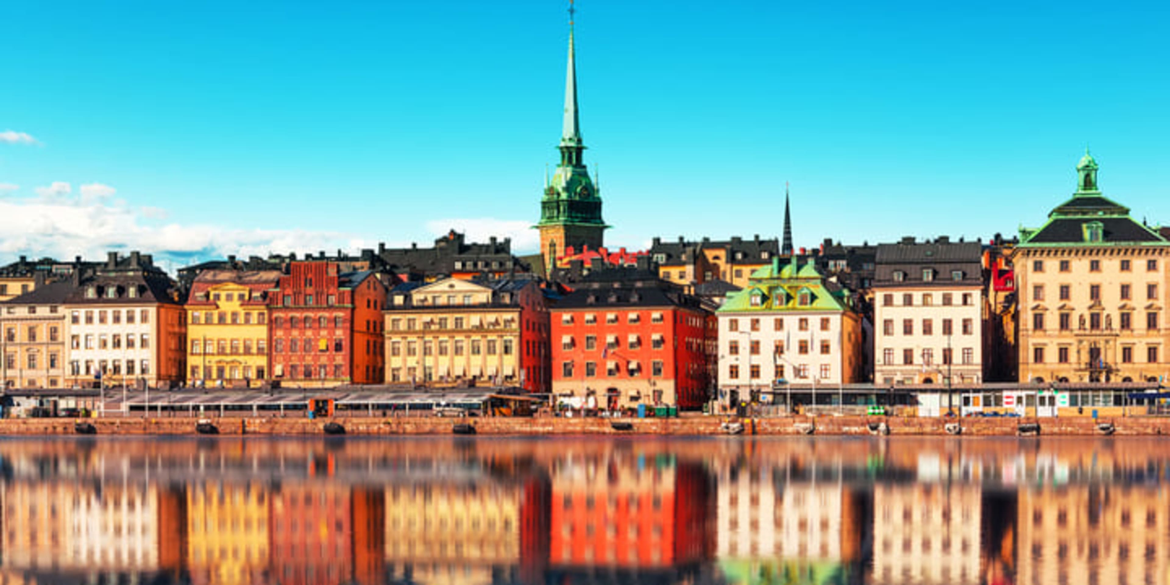 The skyline in Stockholm's old town, dominated by the towering spire of the German Church.