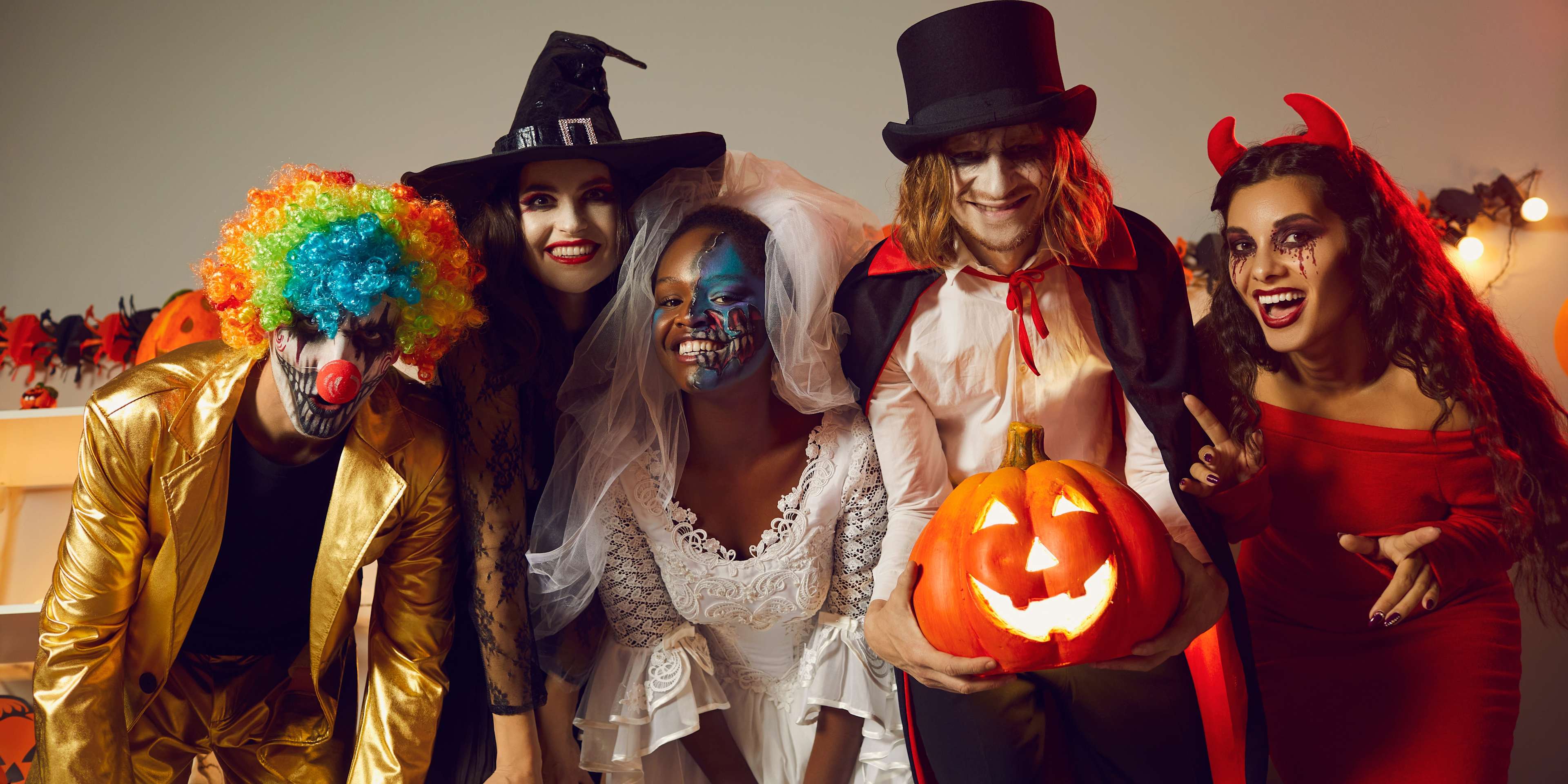 people enjoying a halloween party in full costume