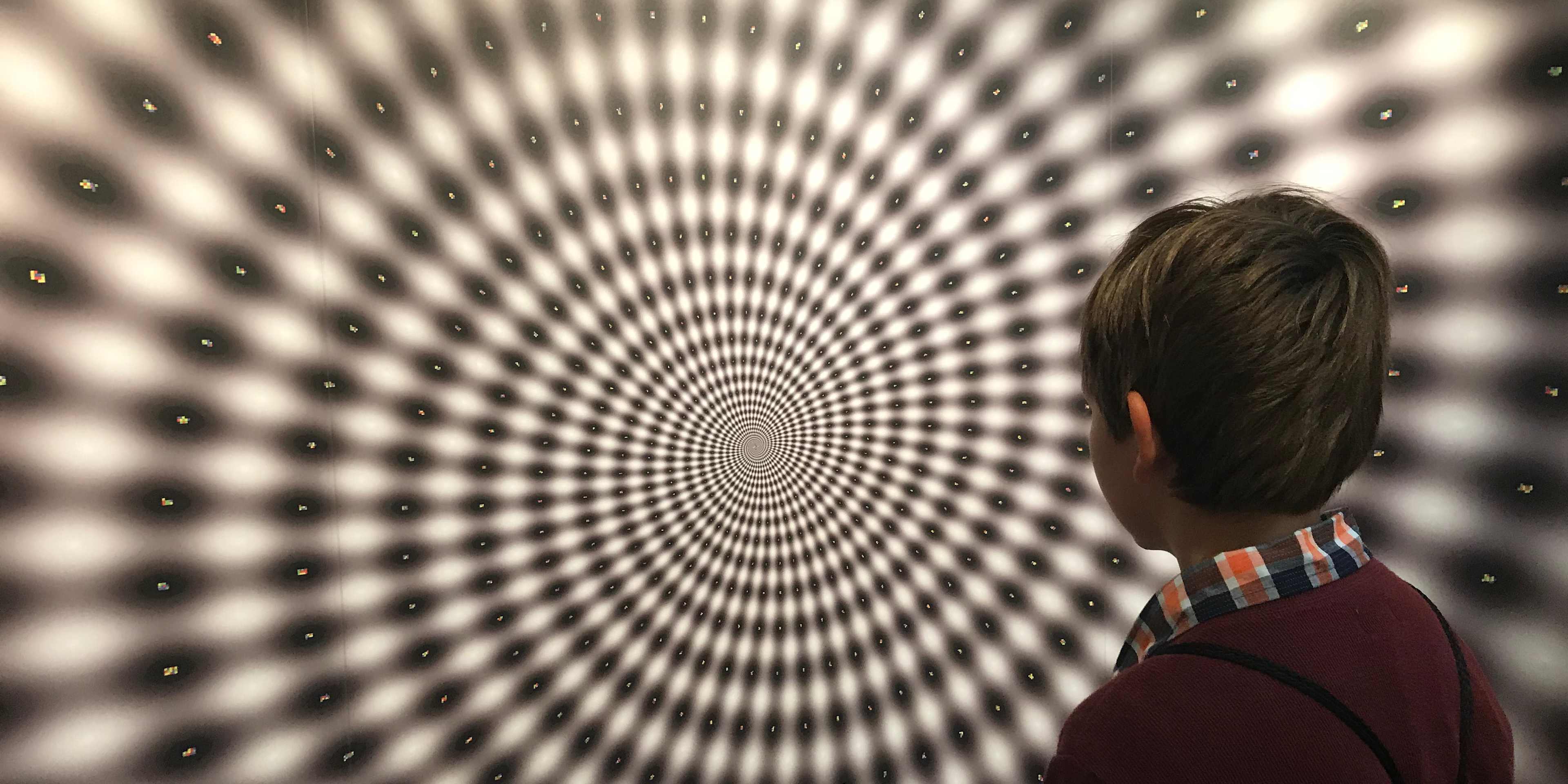 Boy Looking at an Illusion