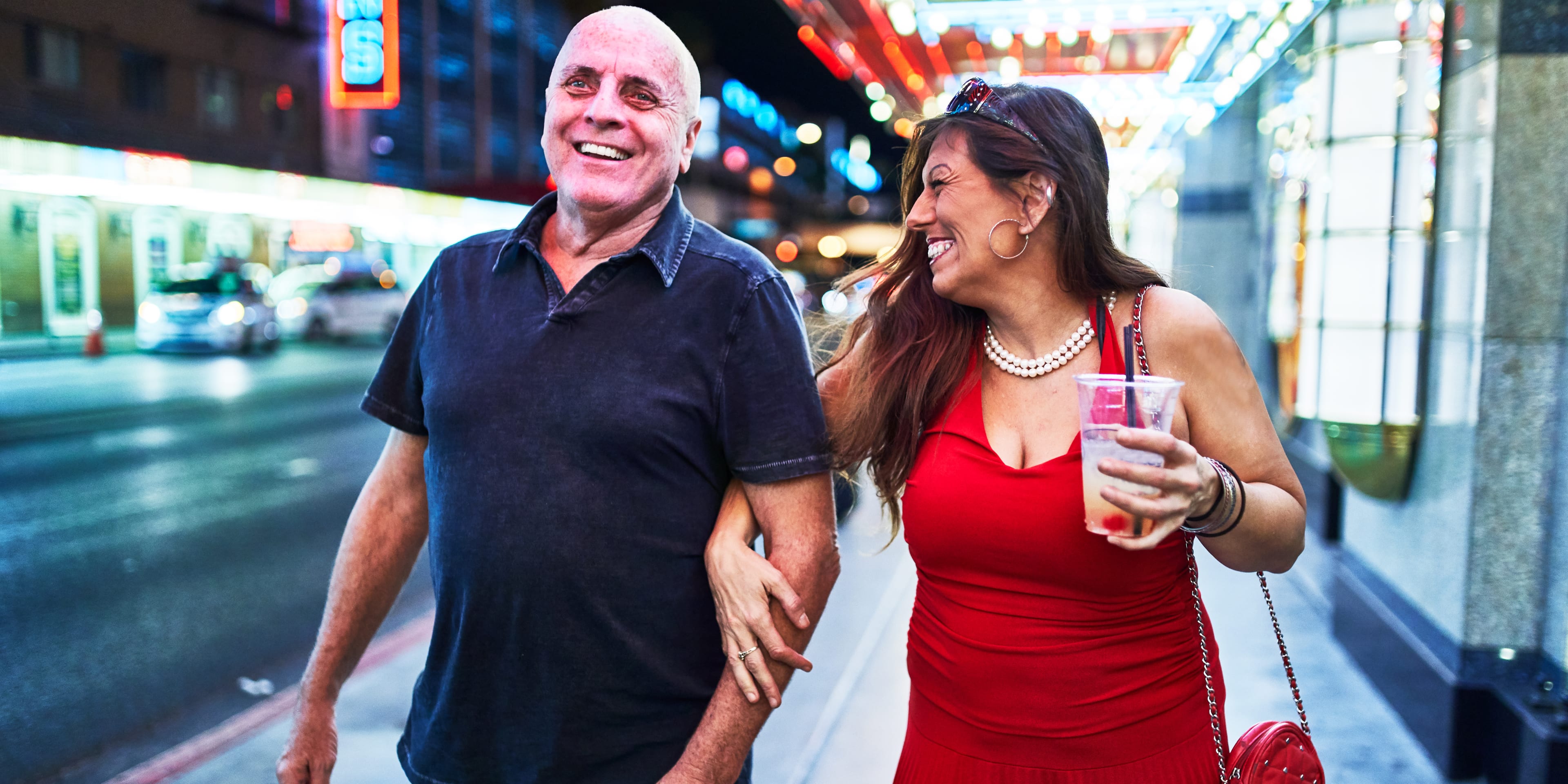 middle aged couple enjoying themselves on the vegas strip