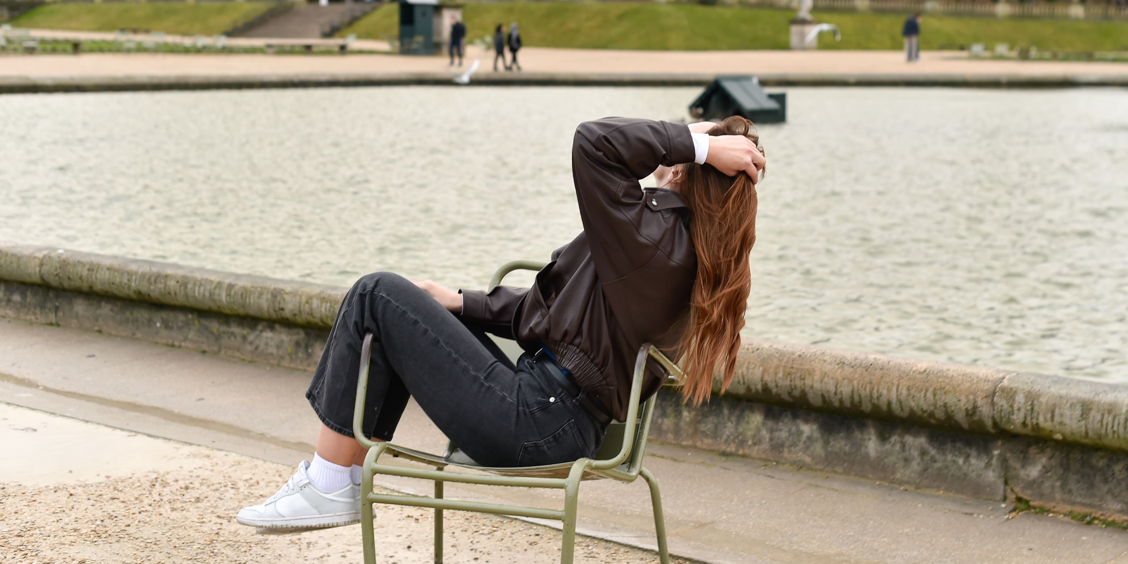 Woman Sat in Luxembourg Gardens
