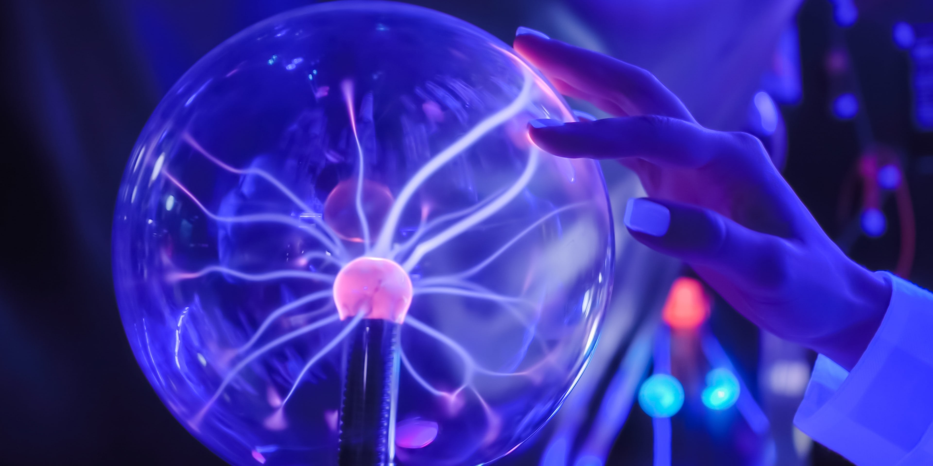 Hand Touching Plasma Ball