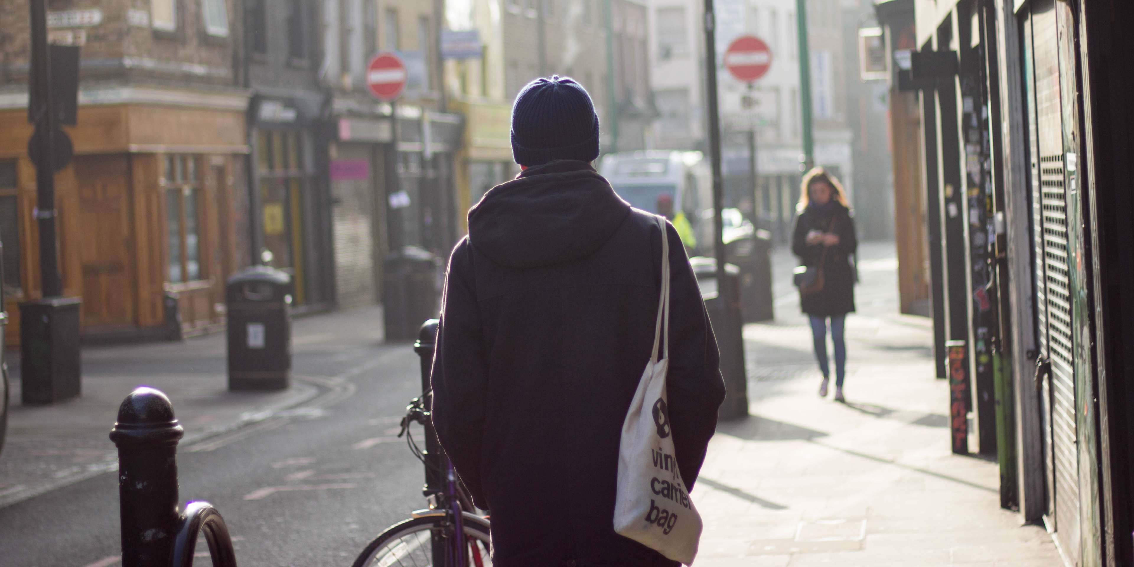 Man exploring Shoreditch's morning street