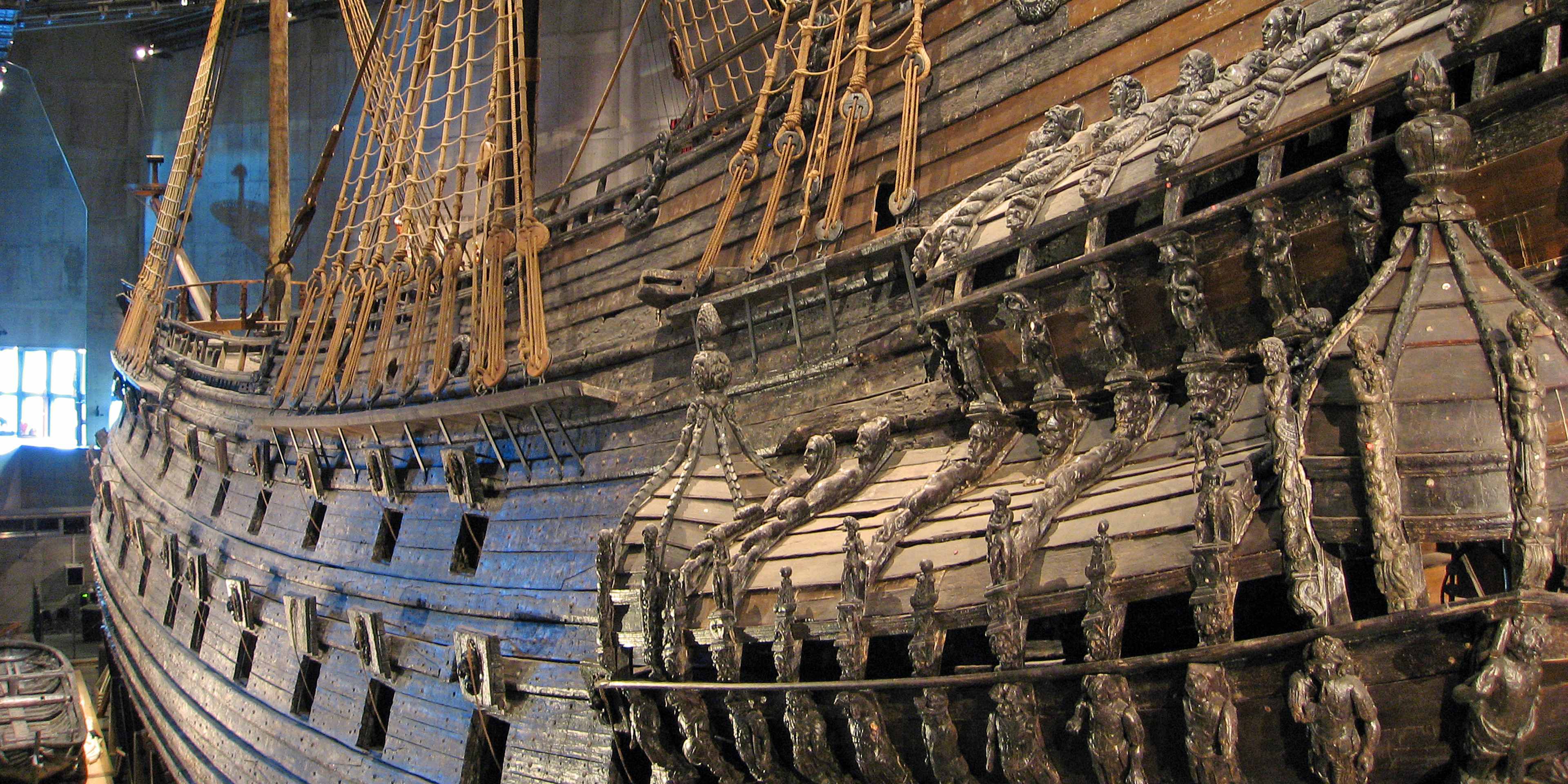 an ancient viking boat in the vasa museum