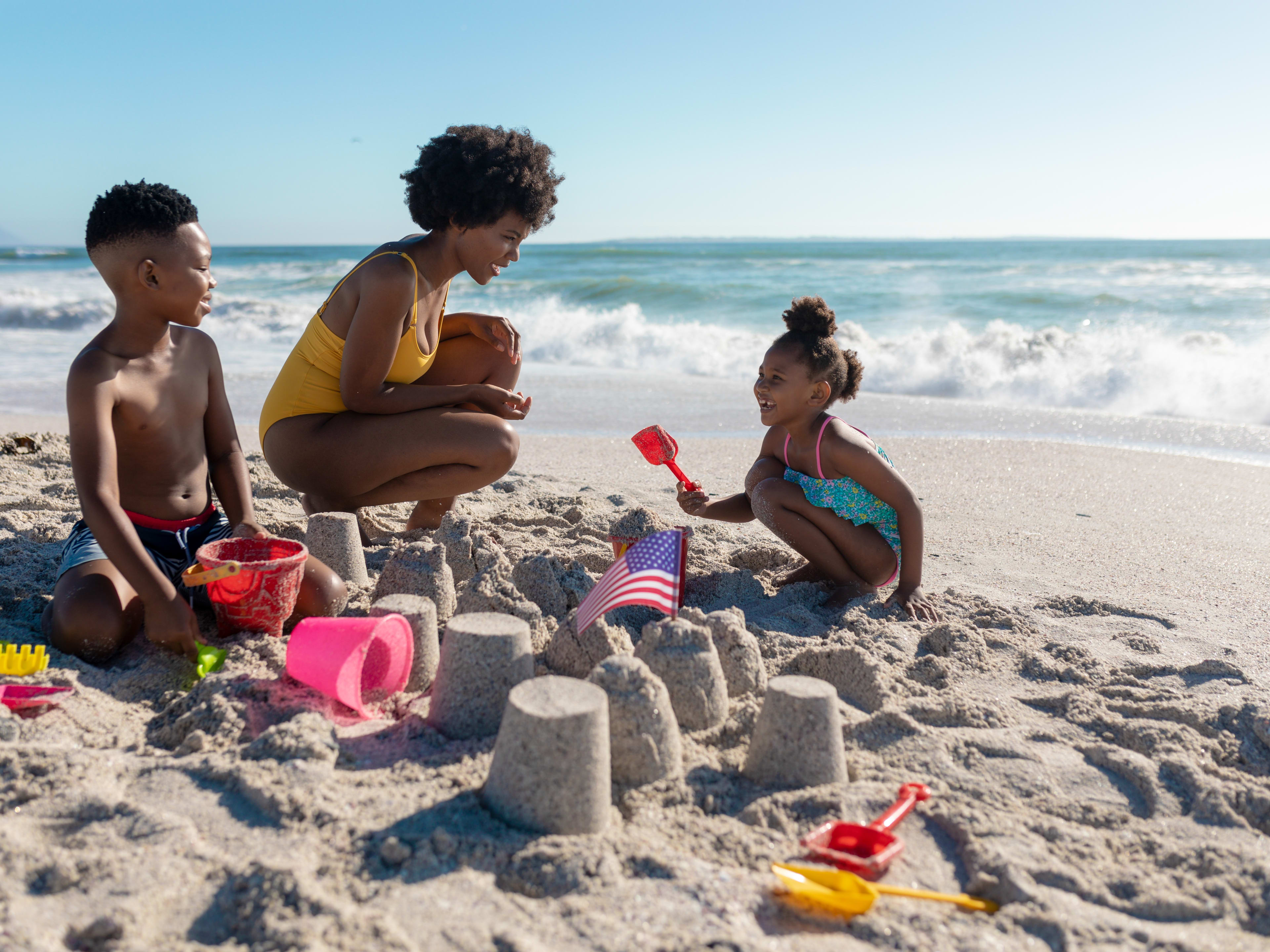 Family at beach having lots of fun