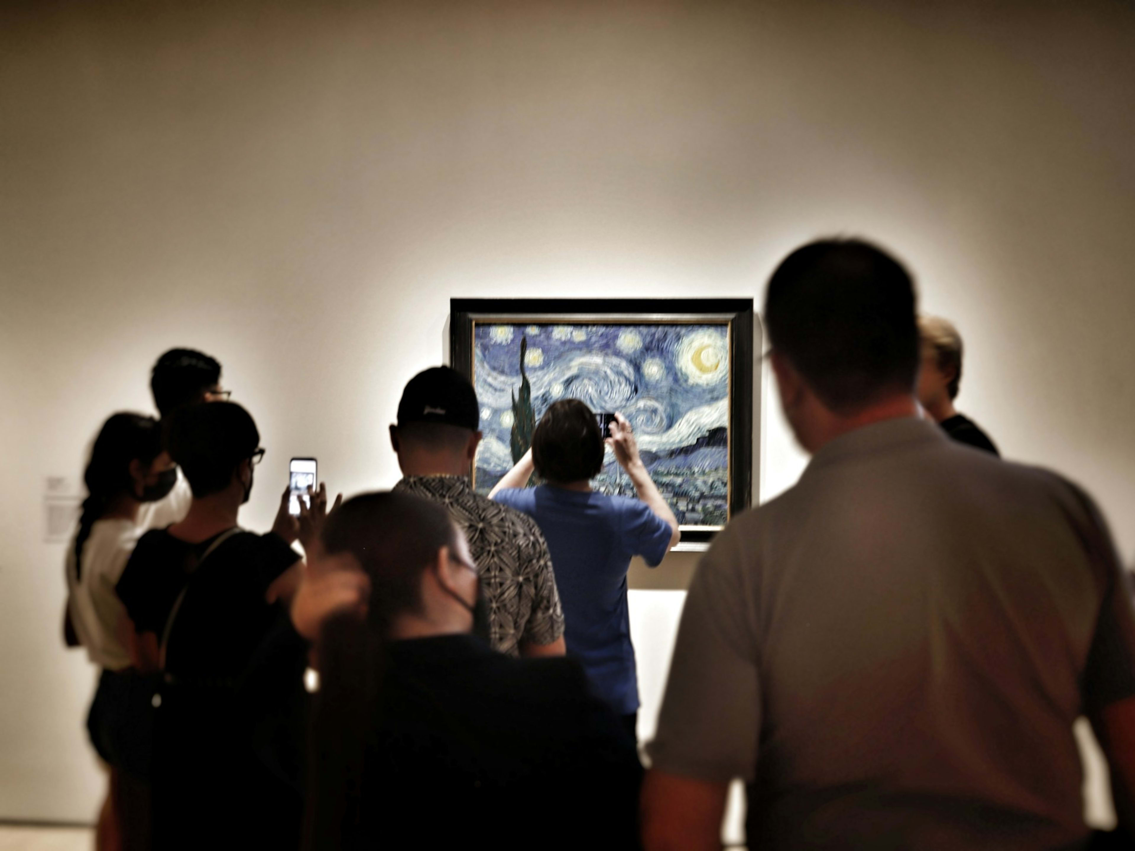 Van Gogh painting drawing a crowd at MoMA NYC