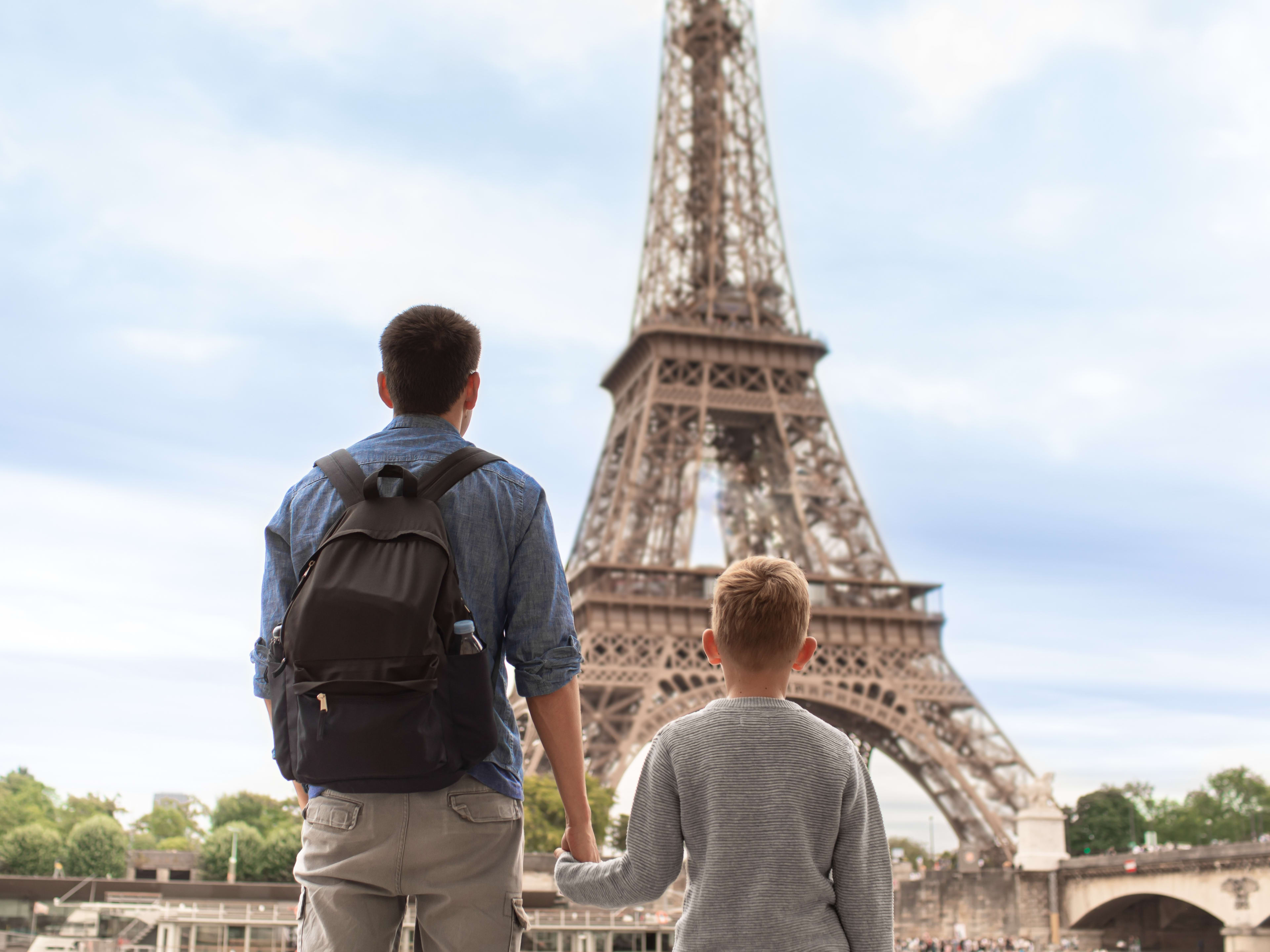 Father and Son in Front of Eiffel Tower