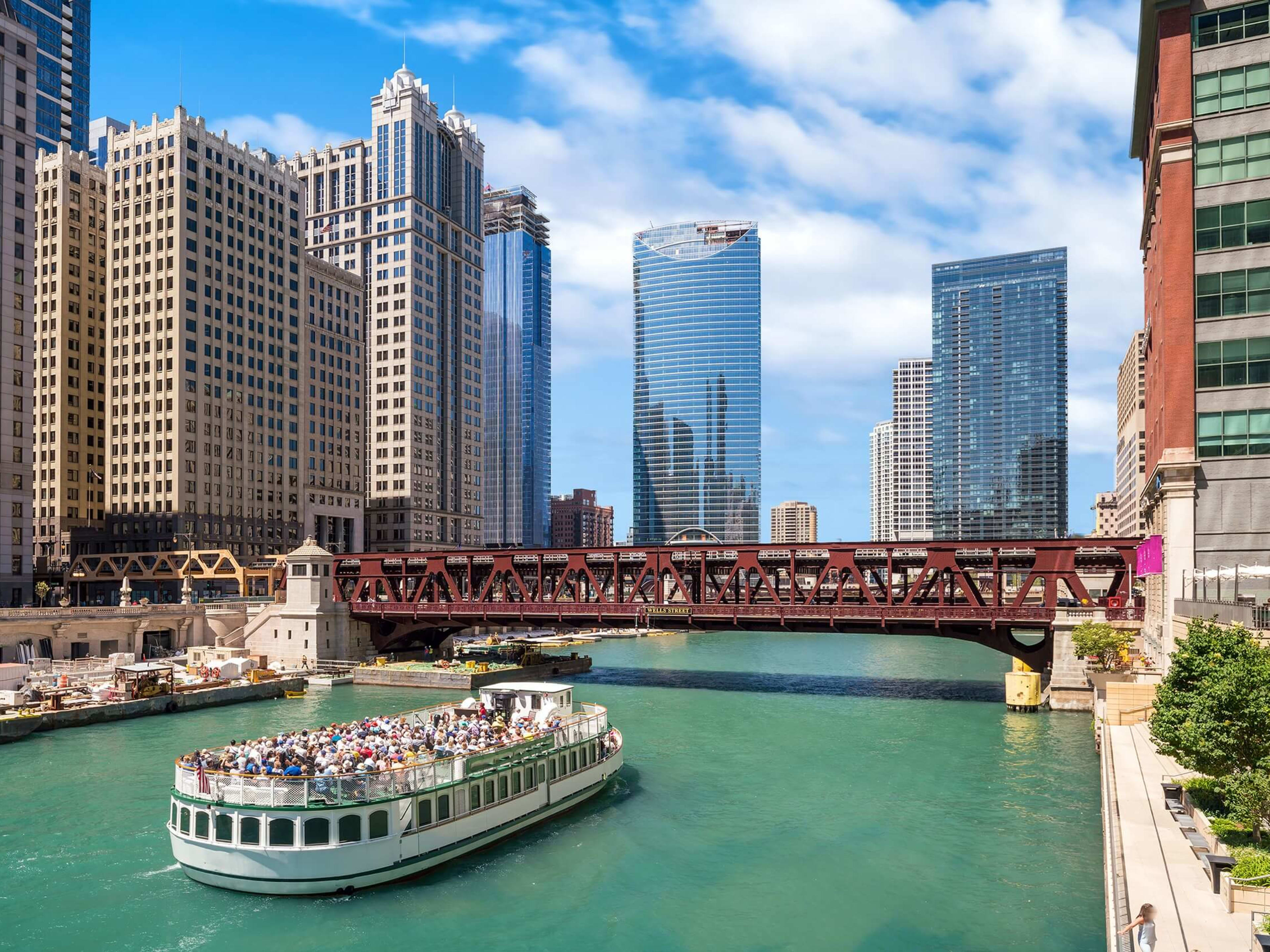A boat traveling along the Chicago River