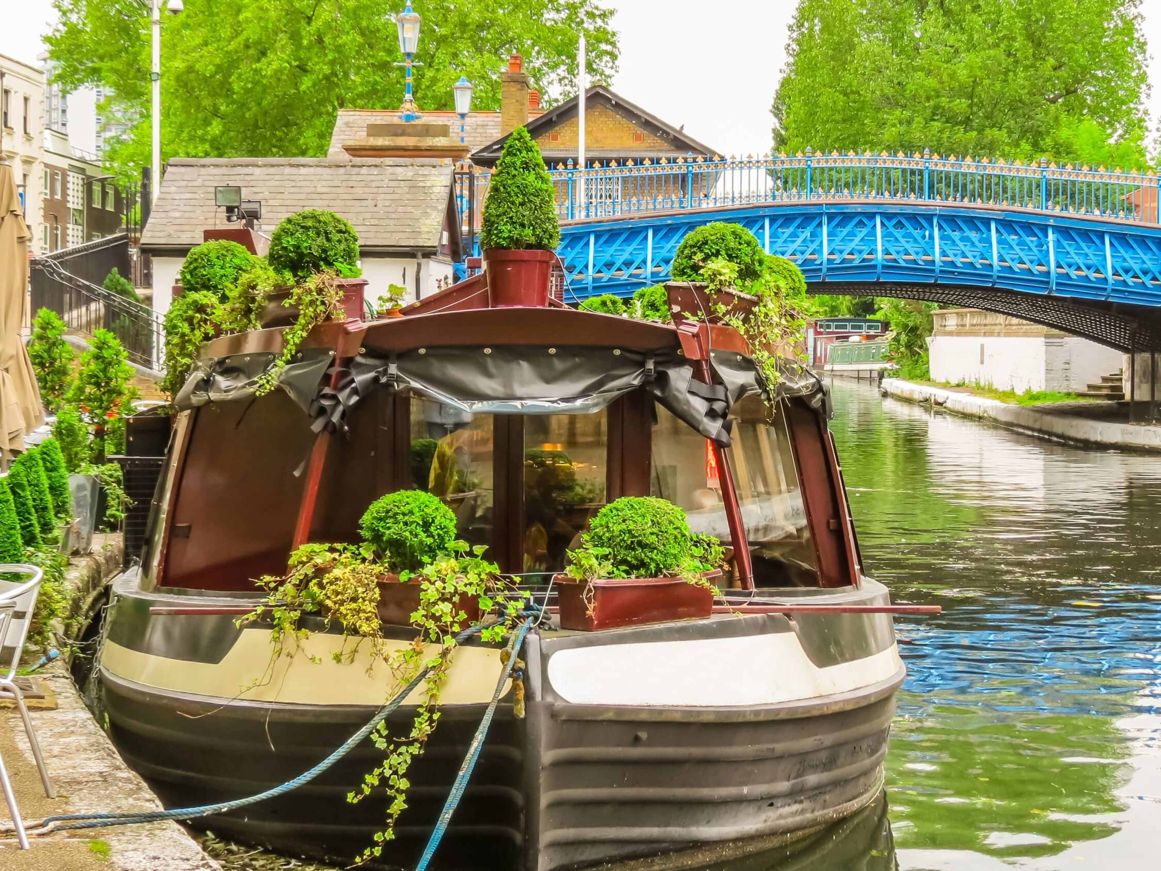 A canal boat and bridge in London's Little Venice