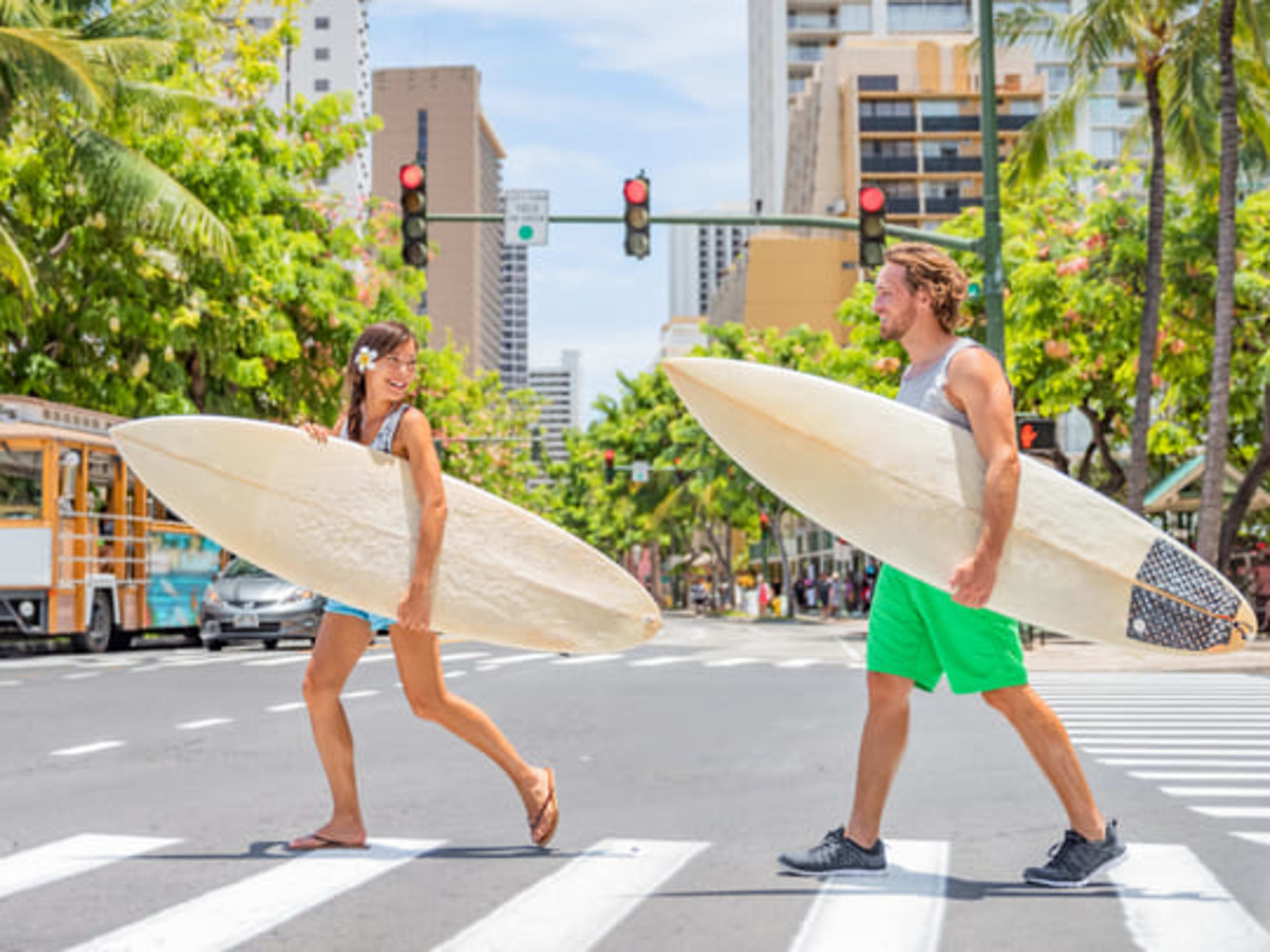 Surfers in downtown Honolulu