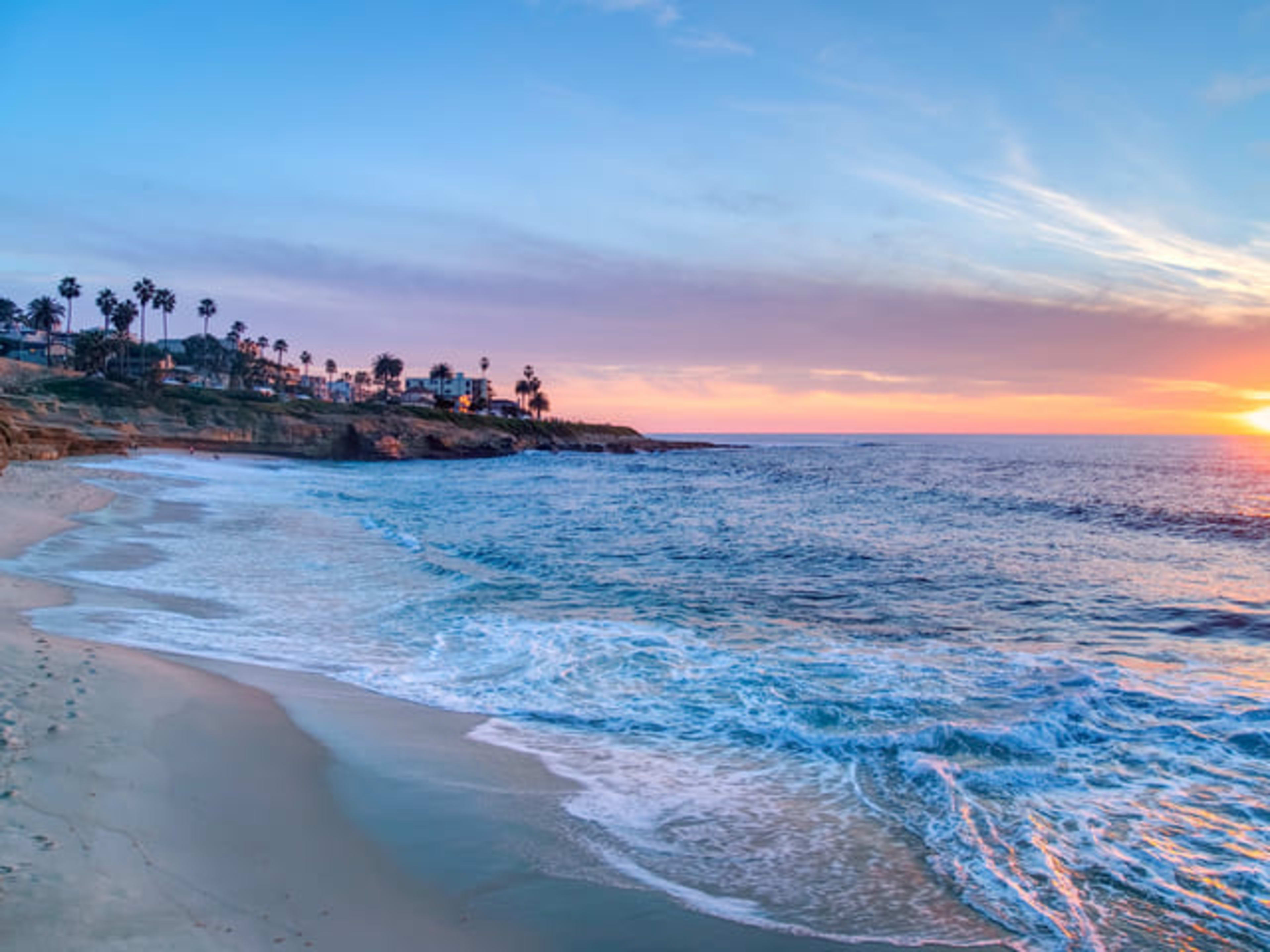 A beach at sunset in La Jolla, San Diego