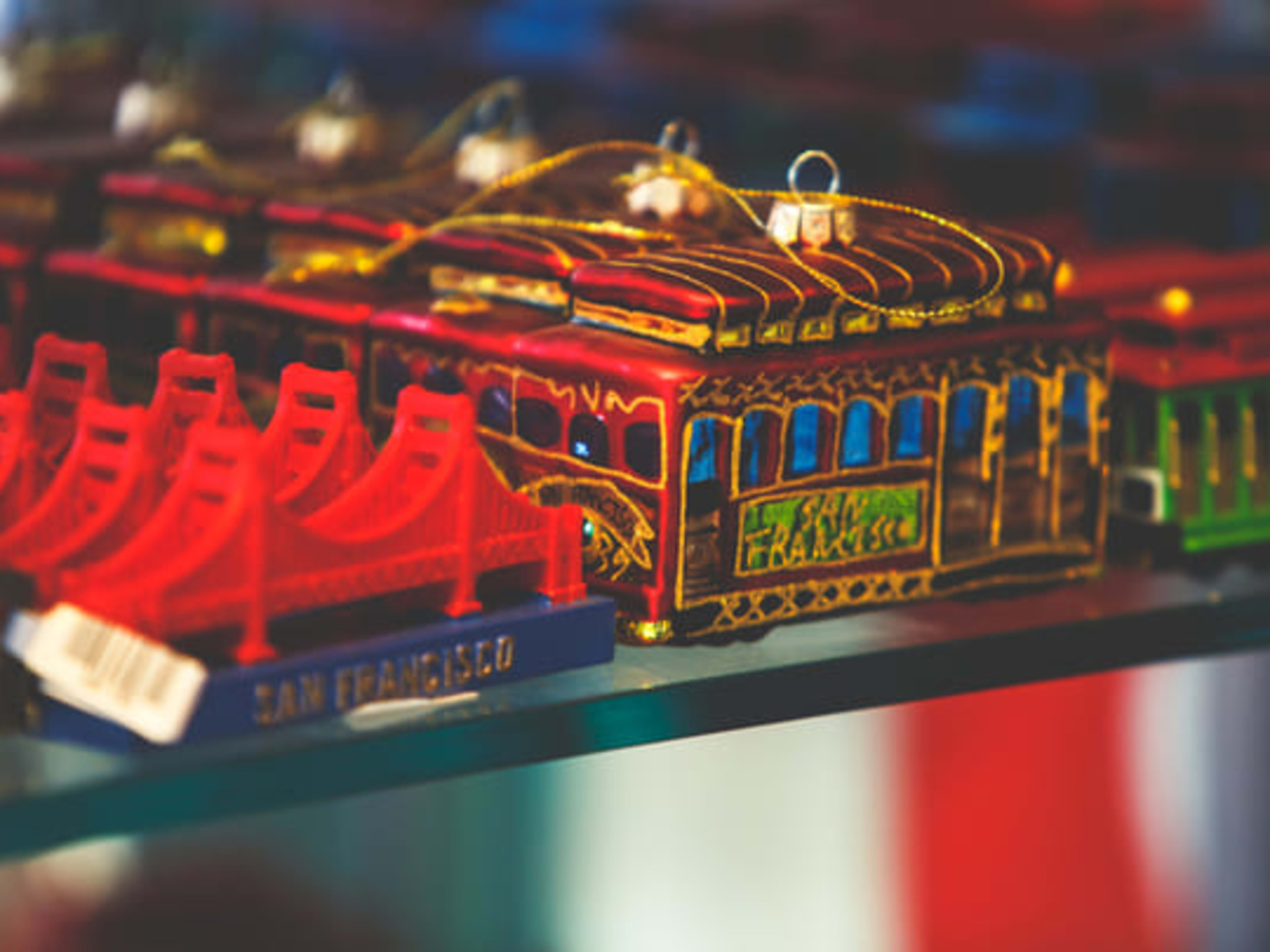 Selection of San Francisco souvenirs including cable car and Golden Gate Bridge ornaments