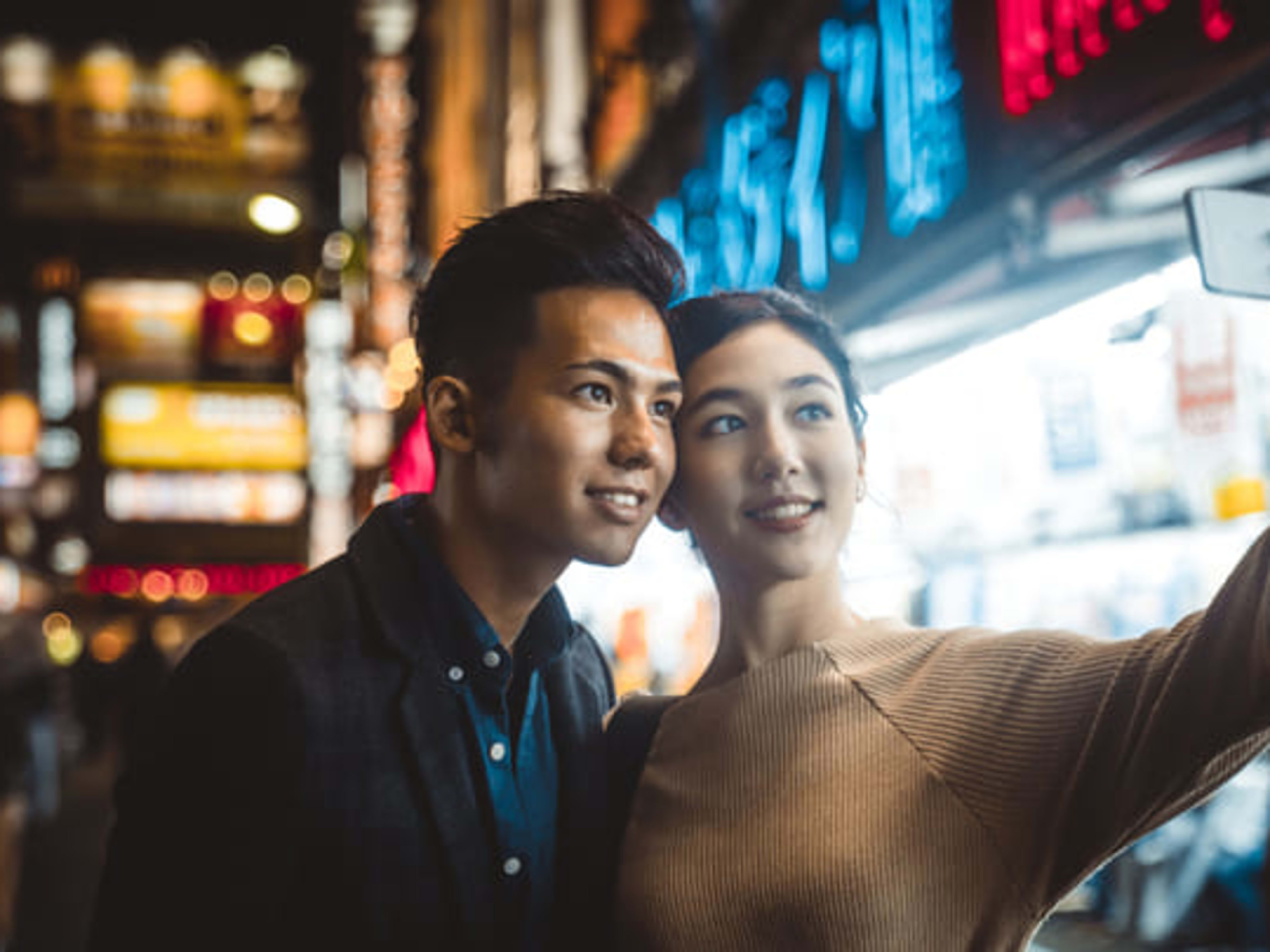 Young couple taking a selfie on a date in Singapore