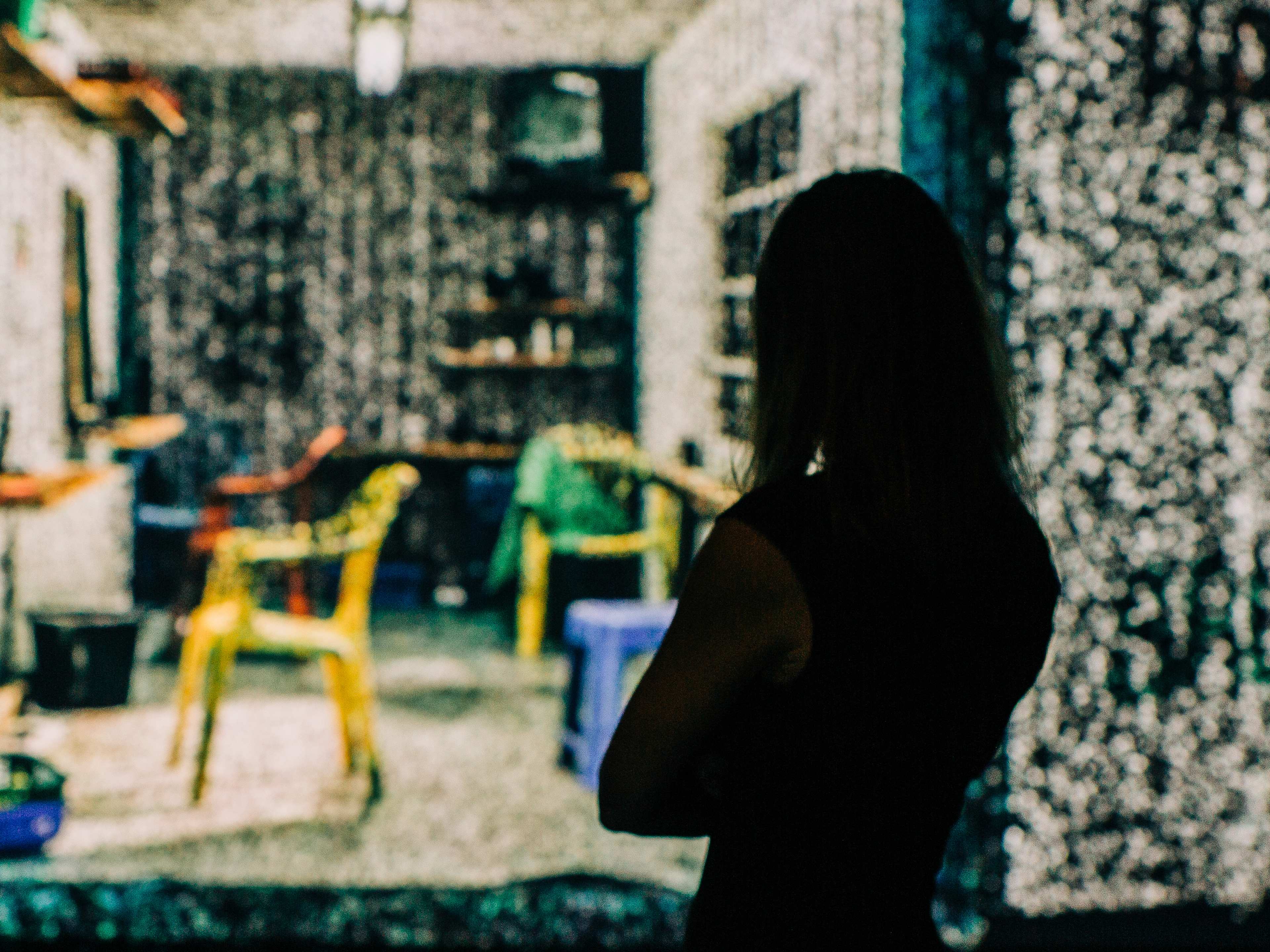 woman observing an image at fotografiska museum