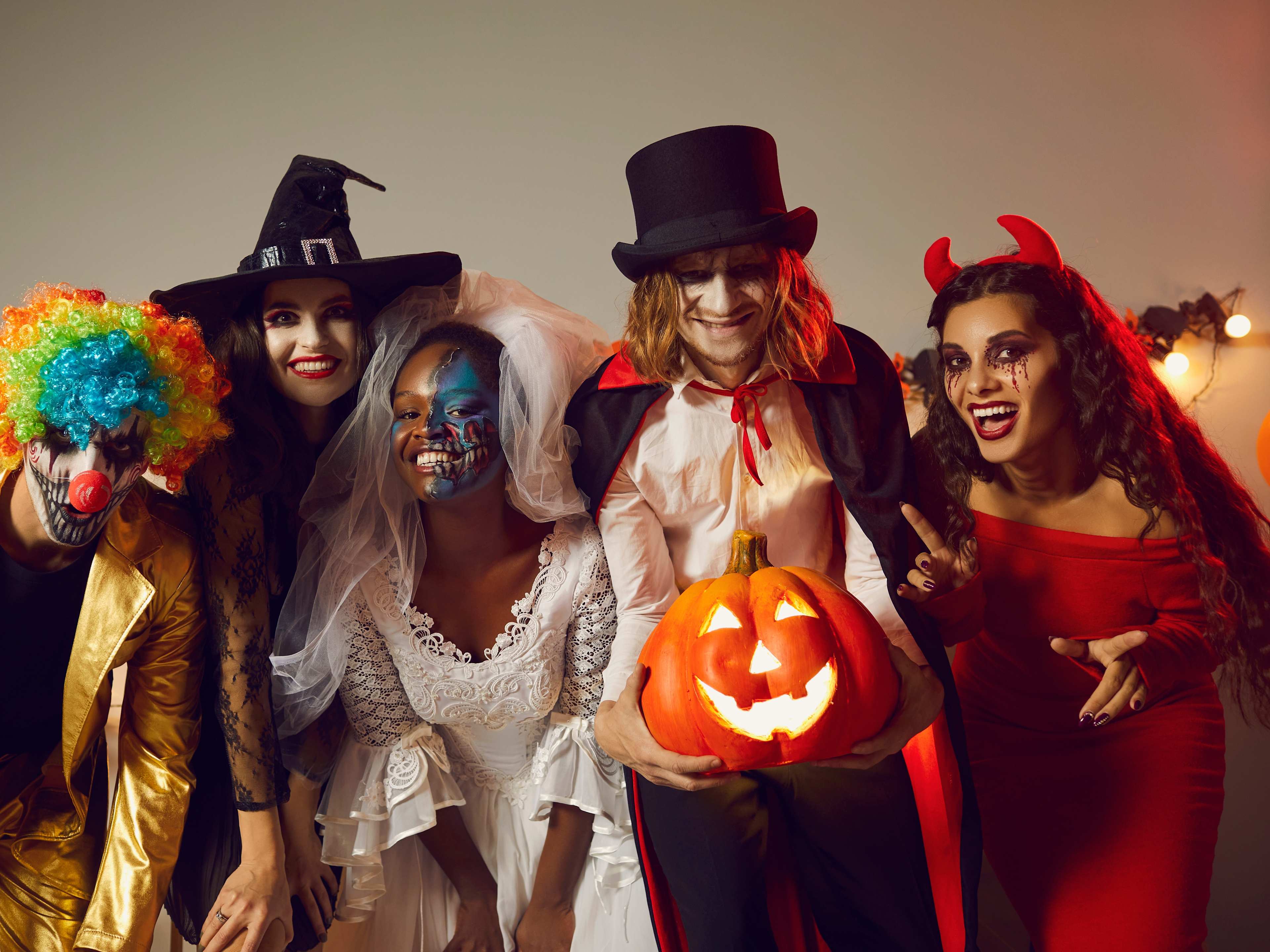 people enjoying a halloween party in full costume