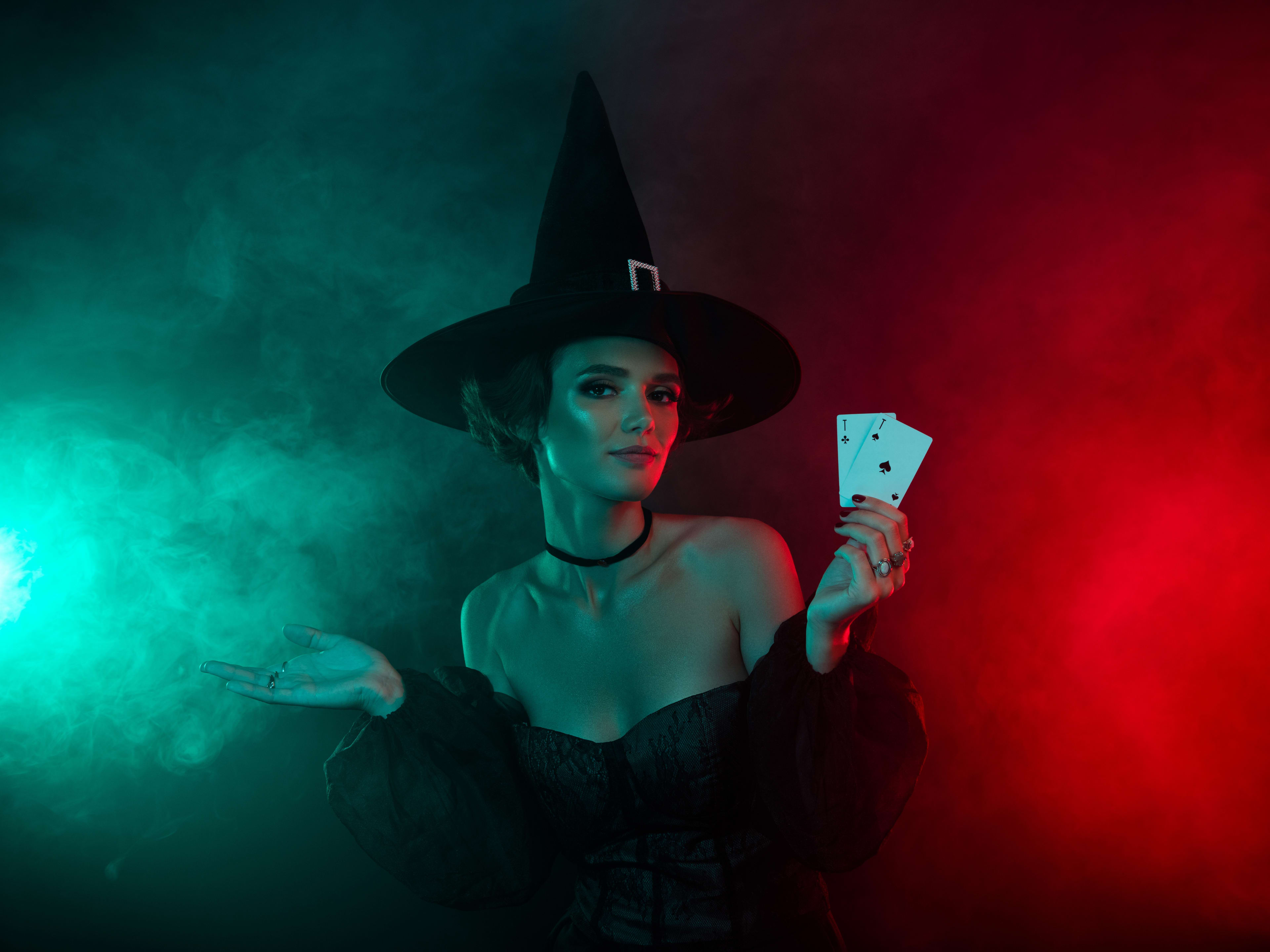 witch playing with betting chips in las vegas
