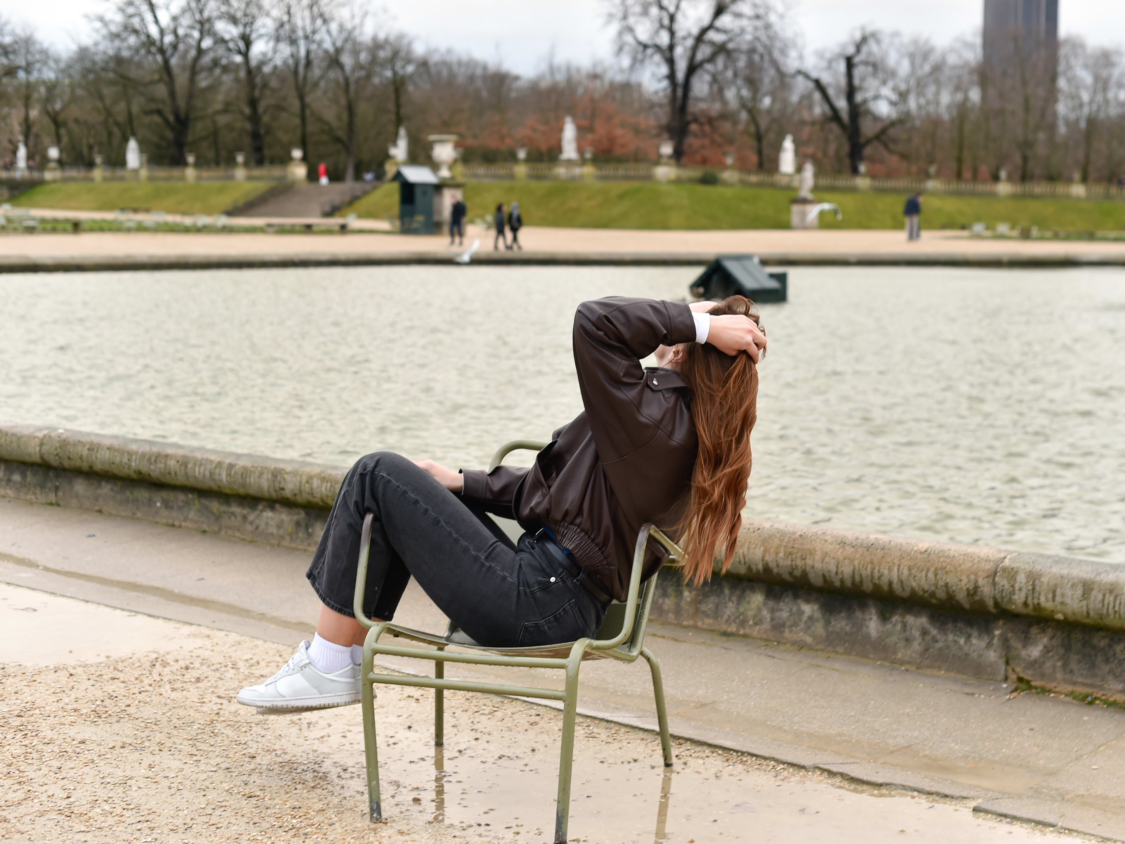 Woman Sat in Luxembourg Gardens
