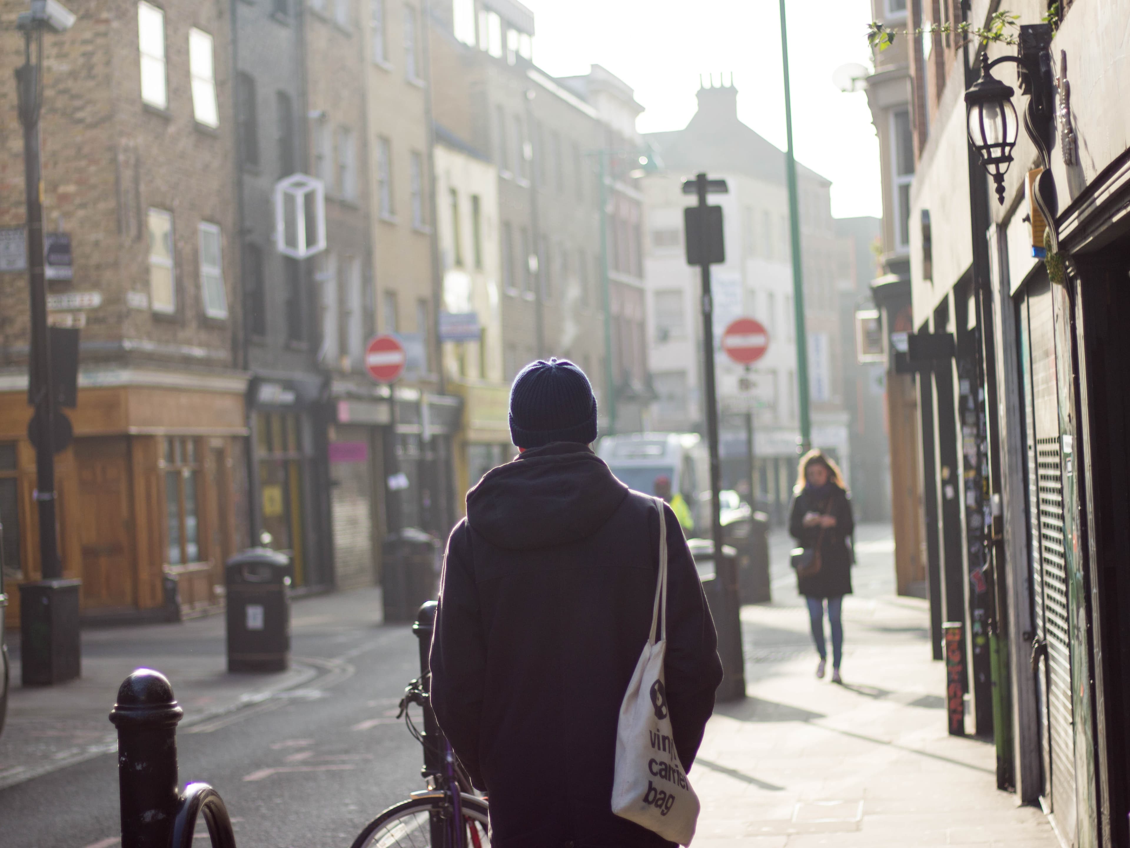 Man exploring Shoreditch's morning street