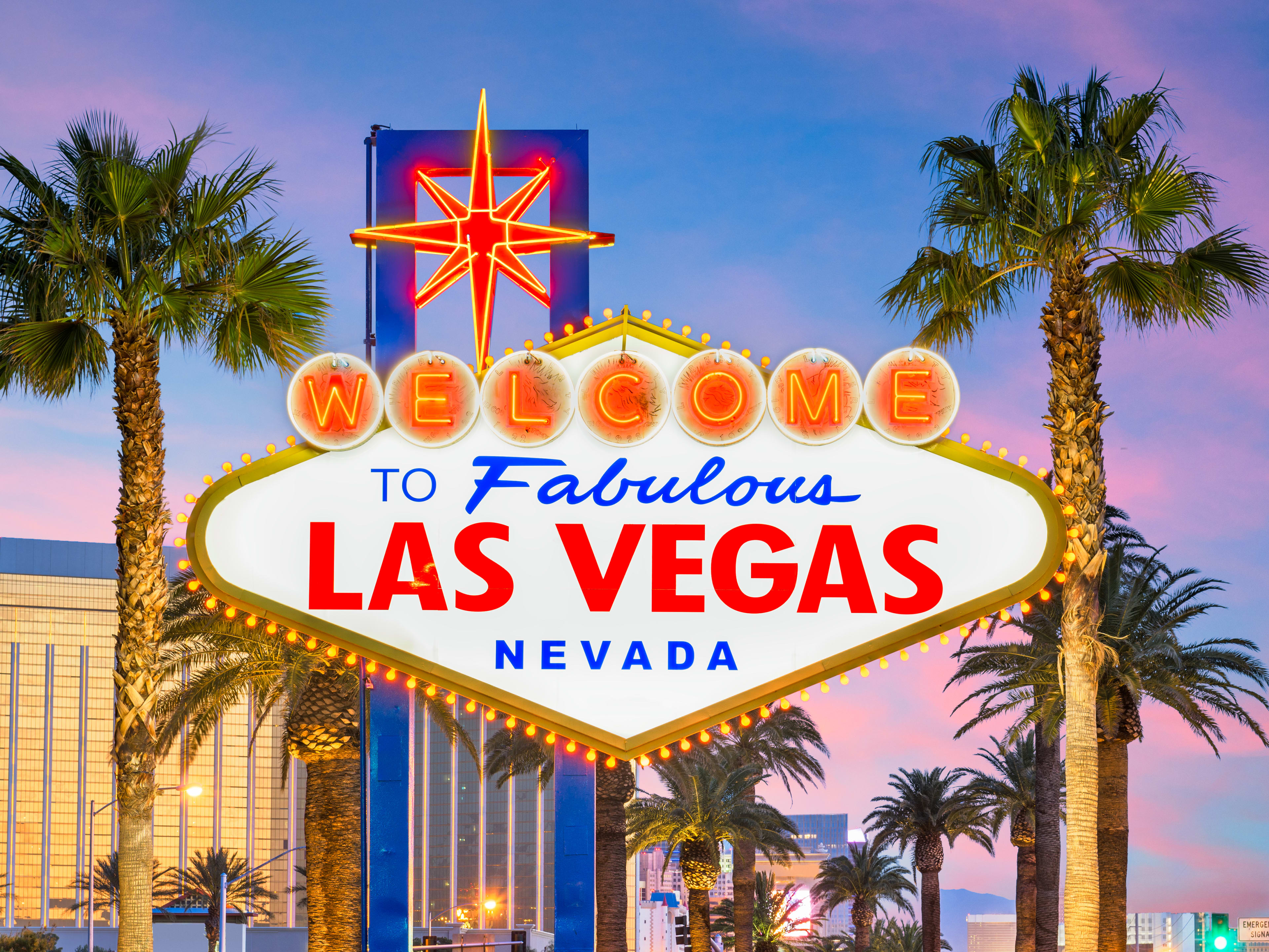 vegas strip with the las vegas sign in front