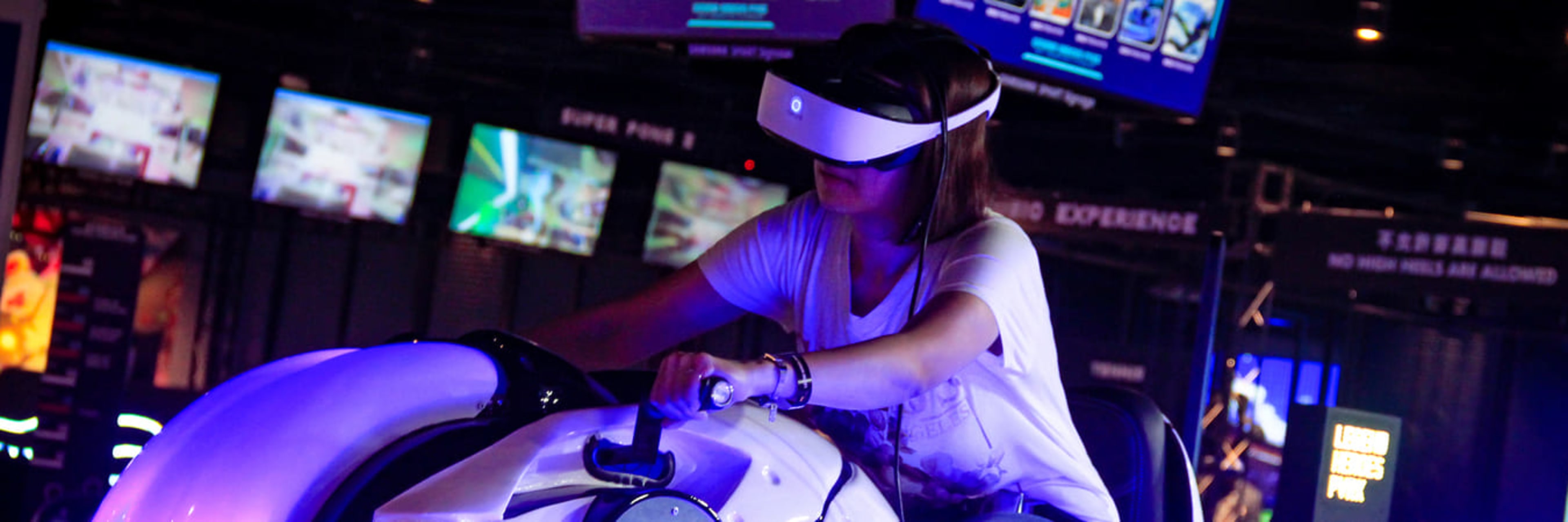 Virtual reality bike riding at Legend Heroes Park in Macau.