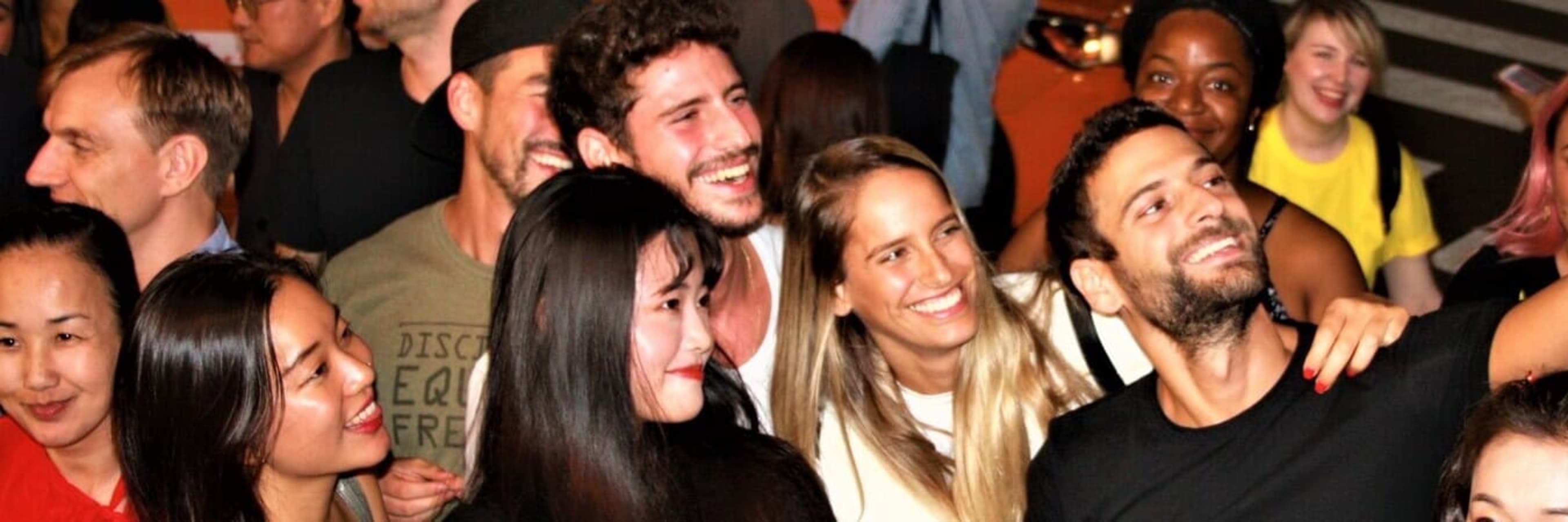 Partygoers taking a selfie on a Seoul pub crawl