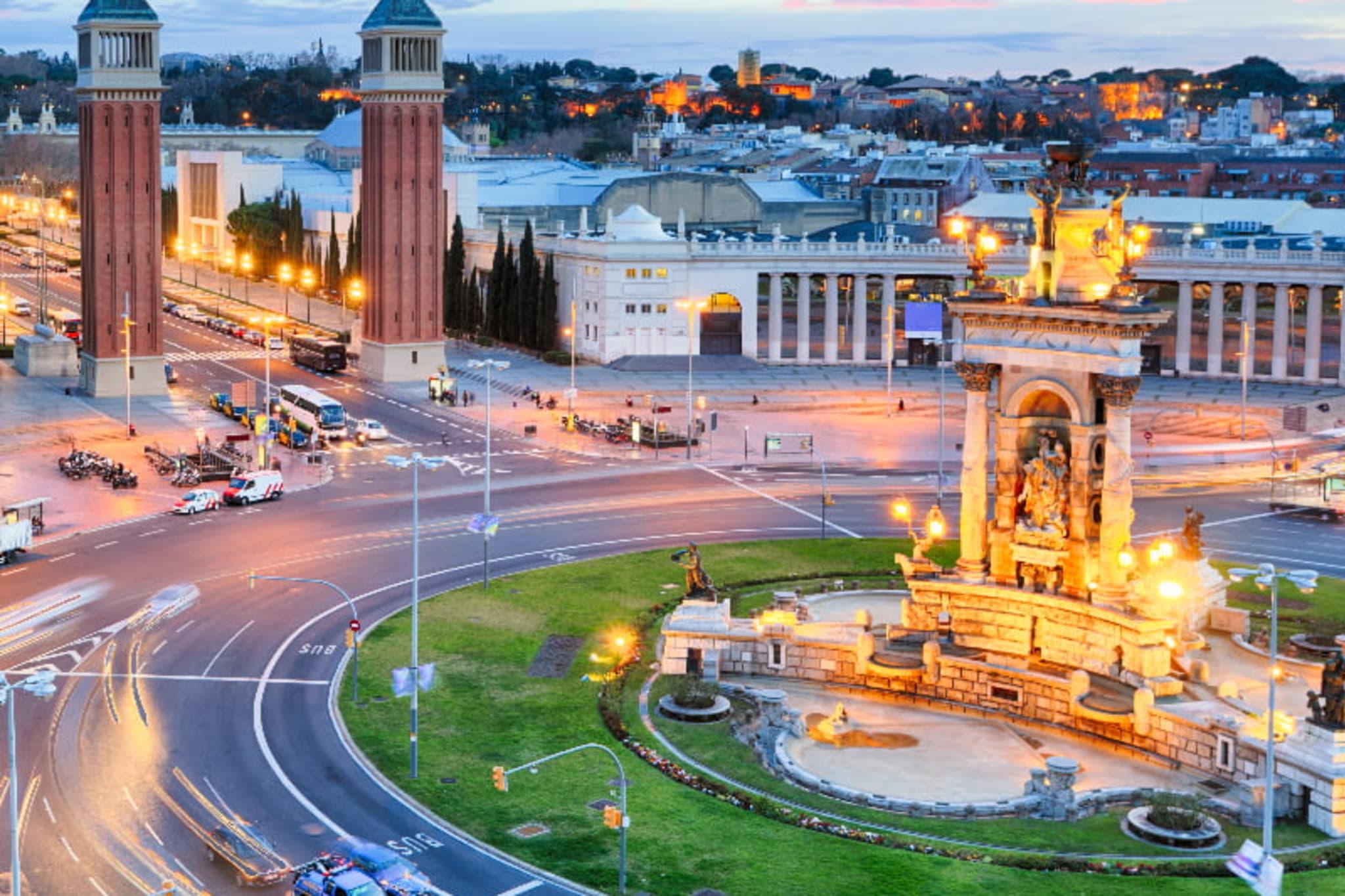 Plaça d'Espanya lit up in the evening