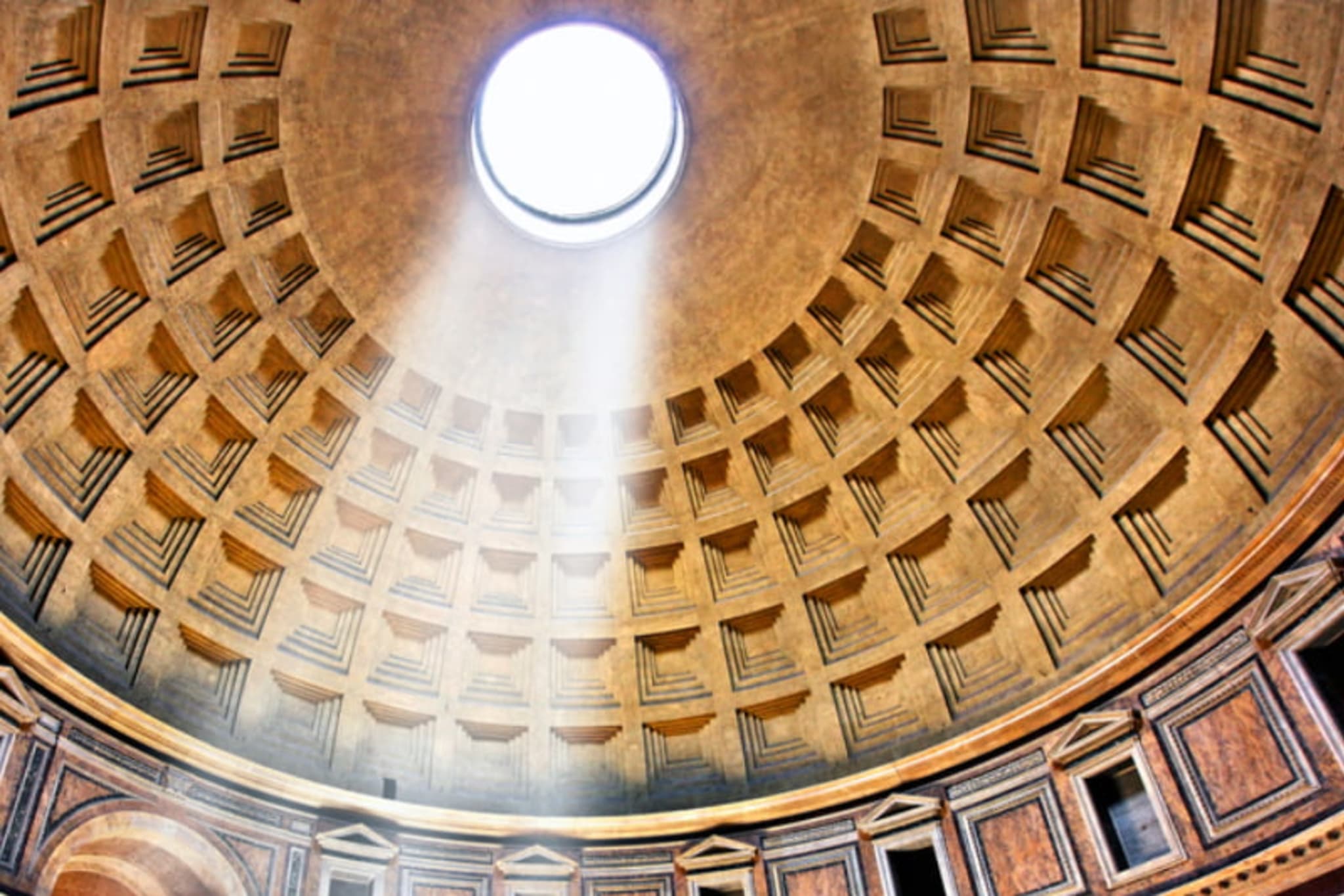 Light shining through the oculus in the roof of the Pantheon