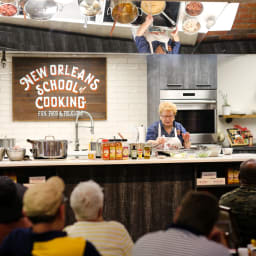 person holding a cooking demo