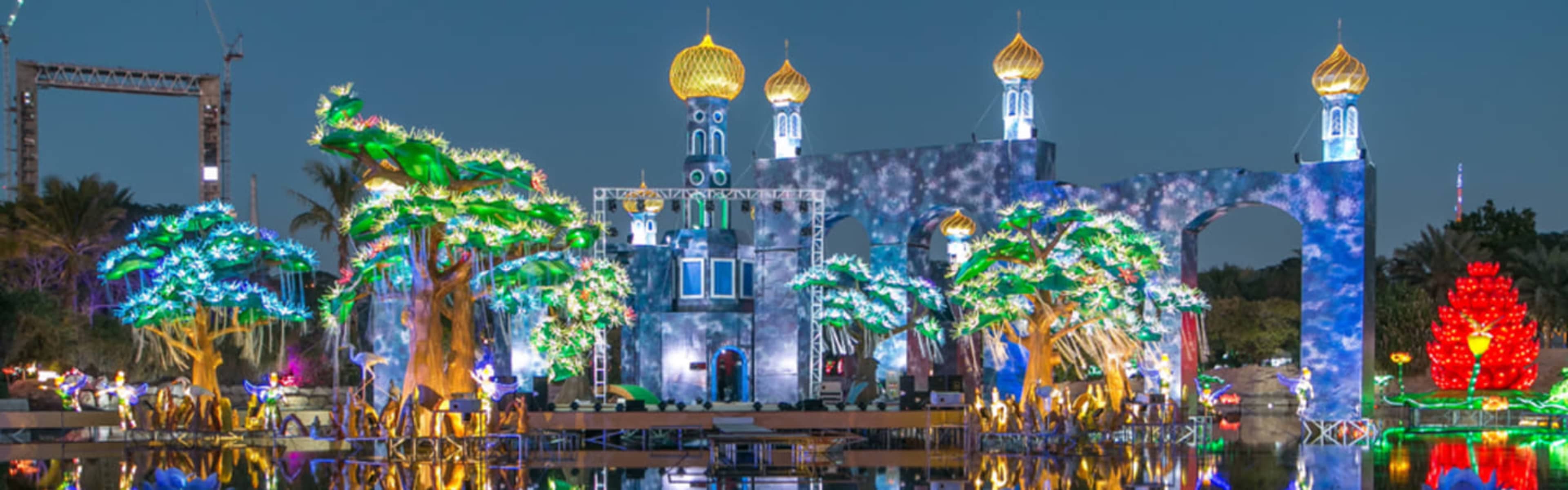 Lakeside castle scene at Dubai Garden Glow.