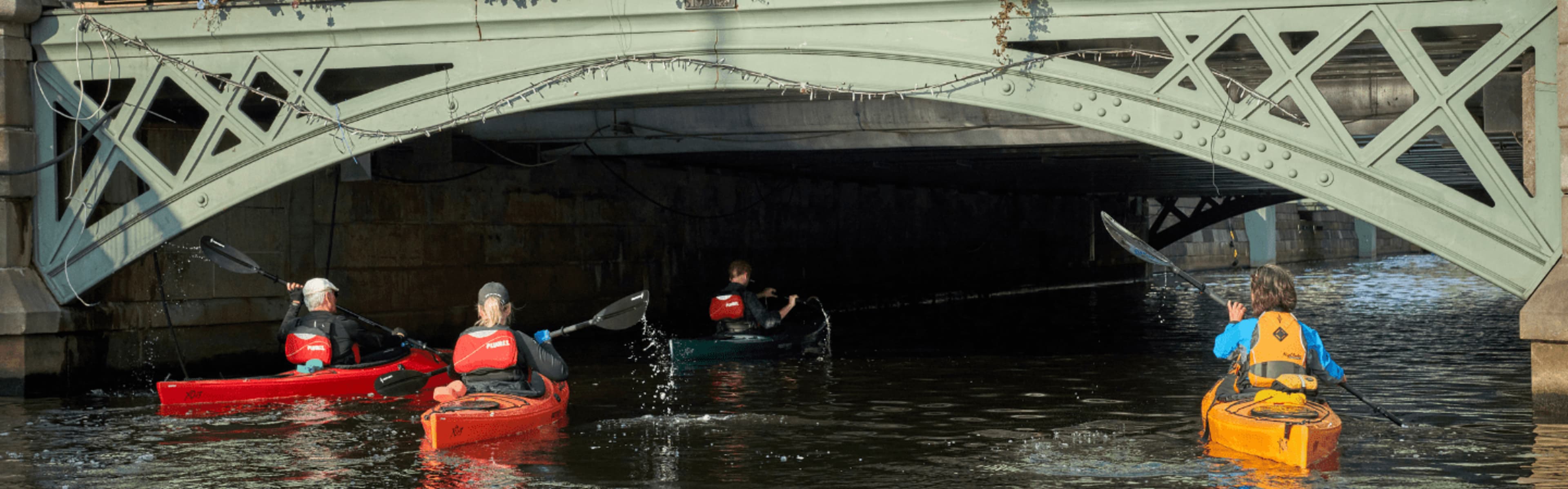 Kayakers on the water in central Gothenburg.