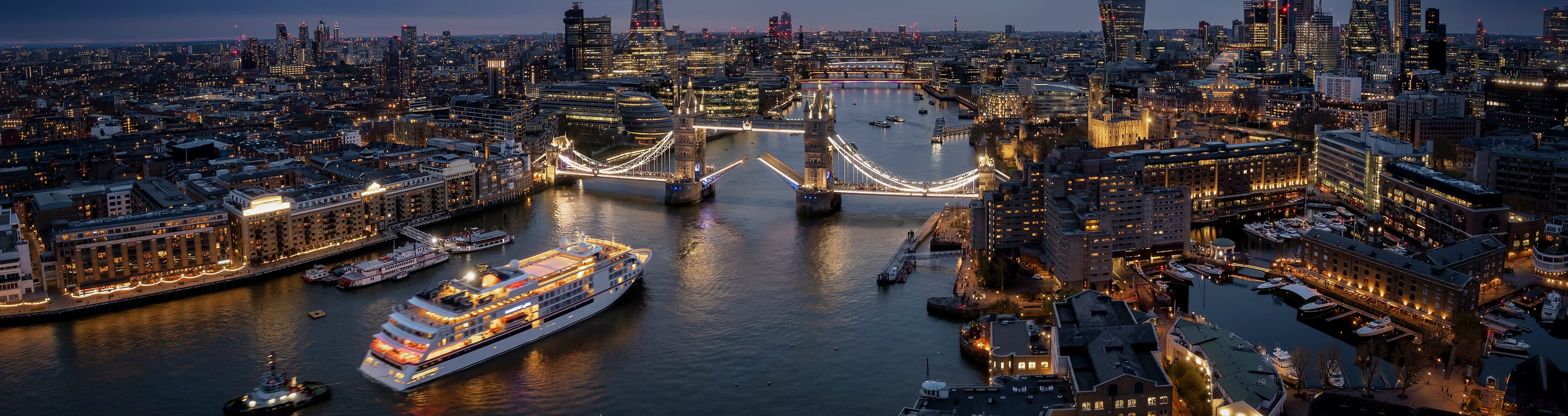 Aerial view of the London, UK skyline at night