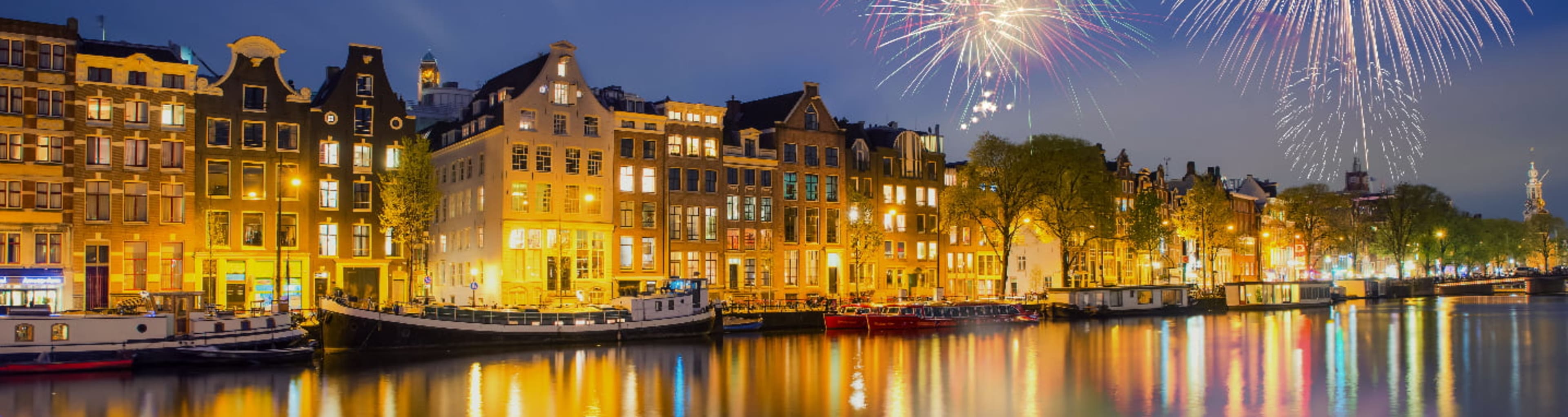 Fireworks over the iconic Amsterdam canal houses