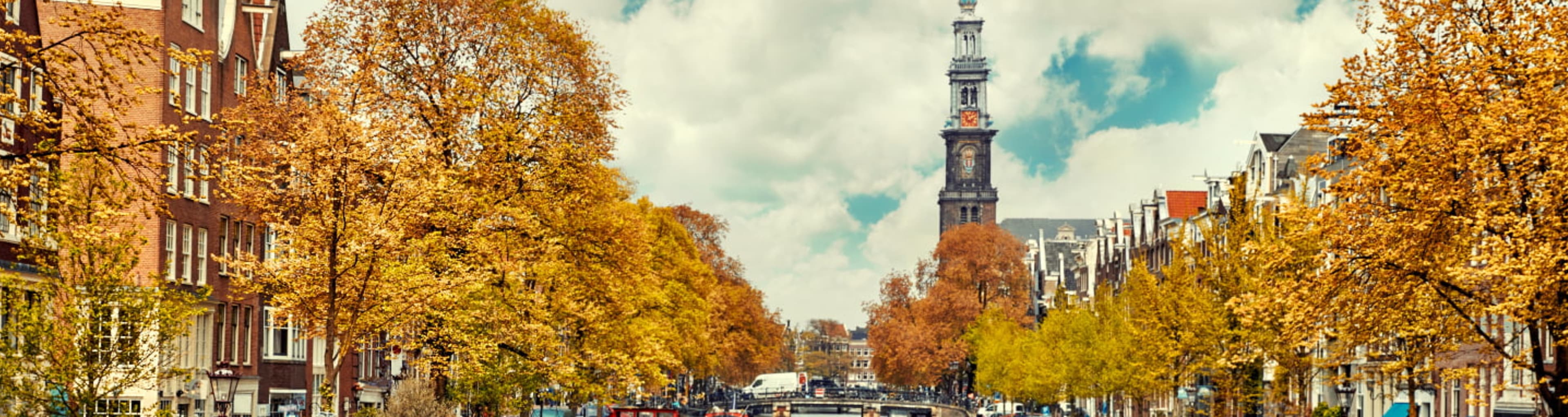 Amsterdam's Munttoren behind a canal