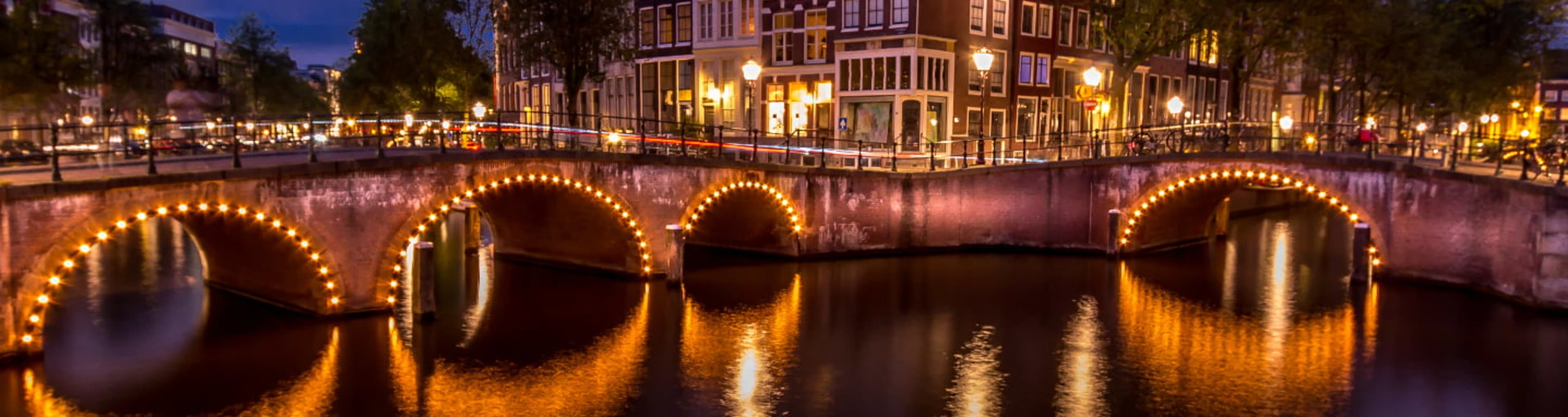 Bridge in Amsterdam illuminated at night