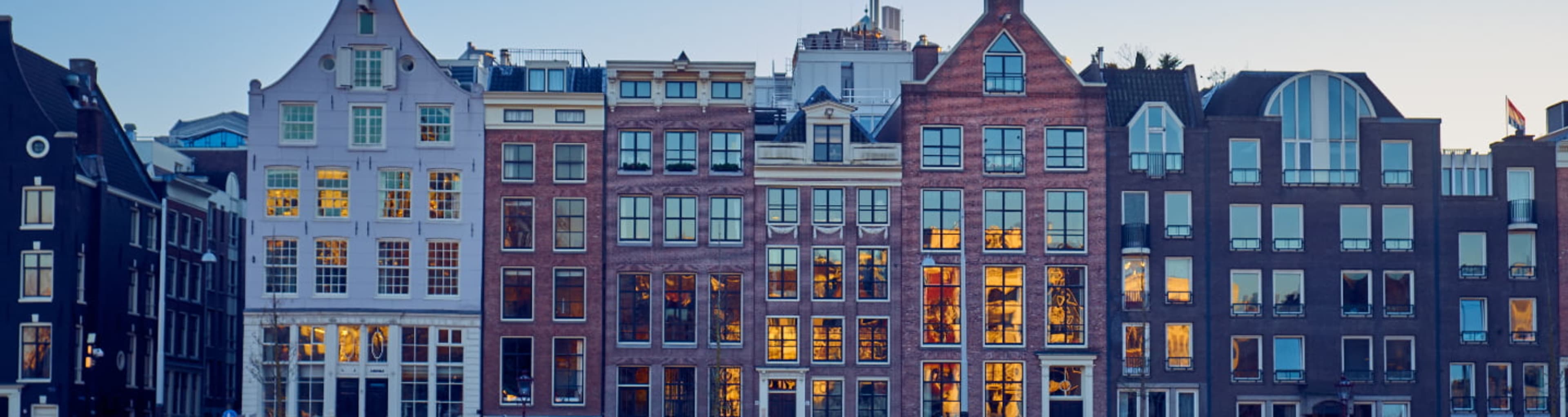 Line of iconic Amsterdam canal houses