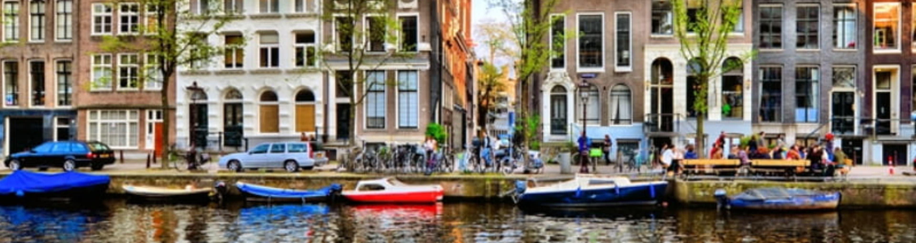 Iconic Amsterdam canal houses reflected in a canal