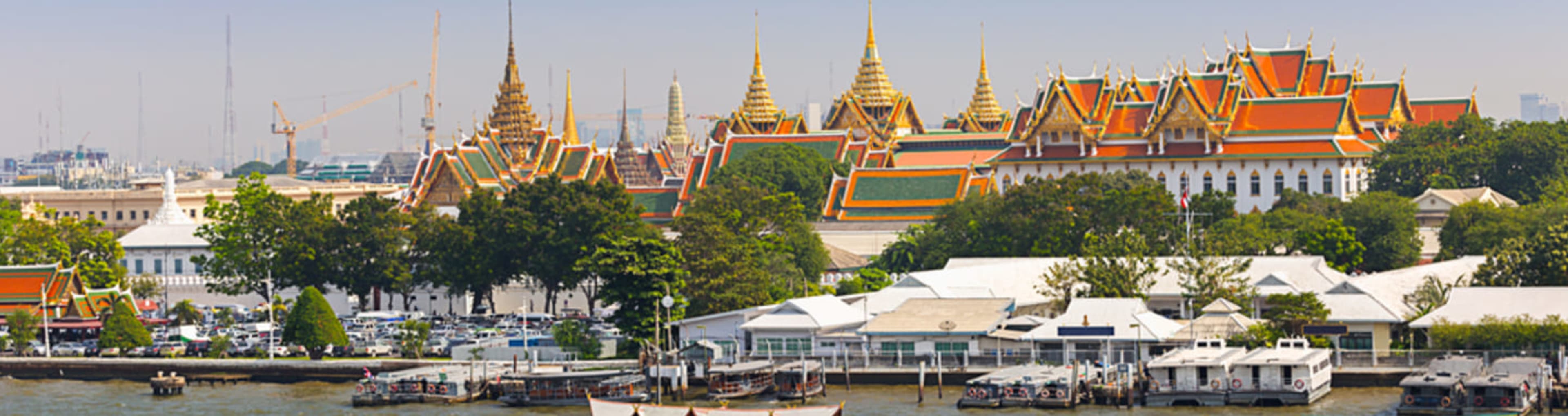 The Grand Palace viewed across the Chao Phraya river in Bangkok.