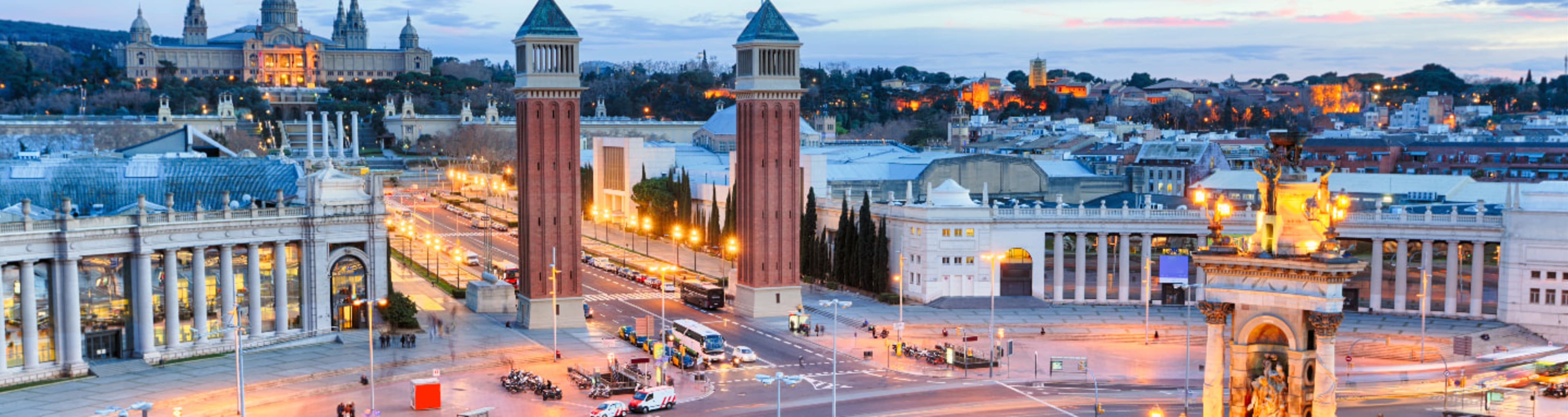 Plaça d'Espanya lit up in the evening