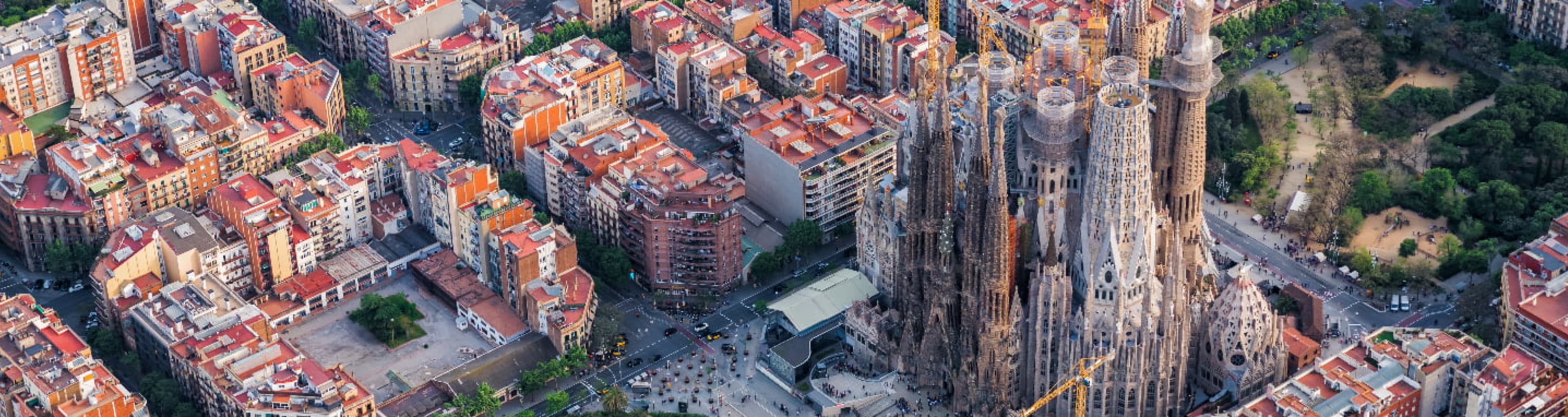 The Sagrada Familia and surrounding city blocks viewed from above