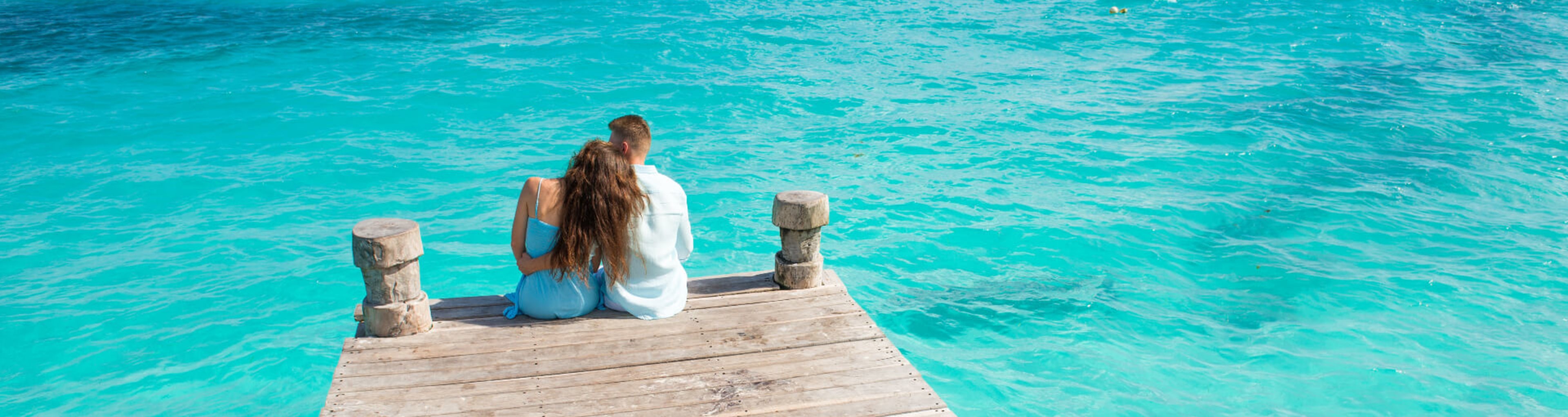 A couple enjoy the sea views in Cancun