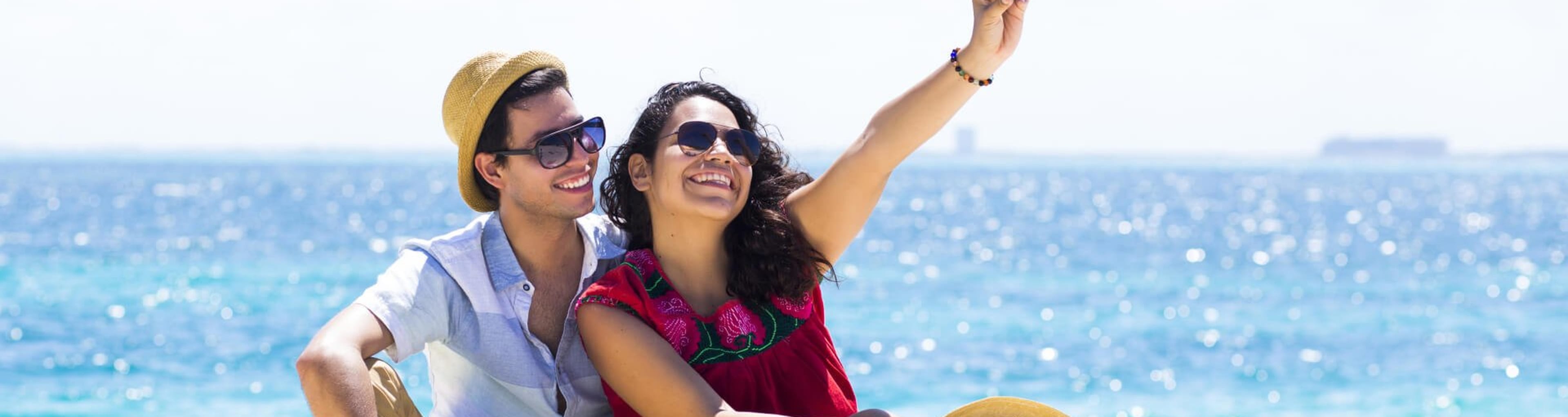 A couple enjoy the beach at Cancun