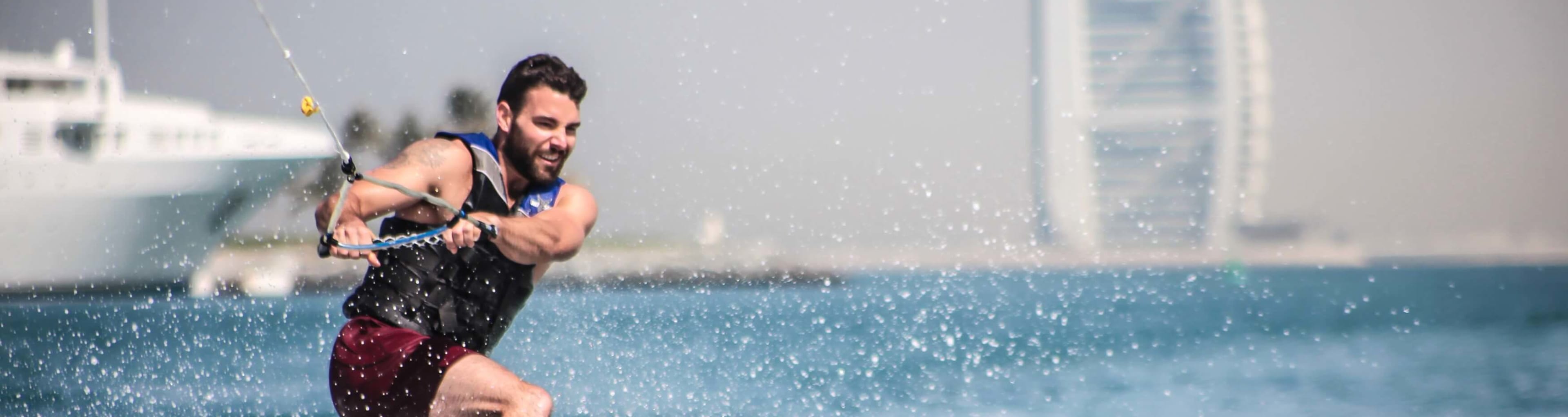 A wakeboarder with the Burj Al Arab as a backdrop