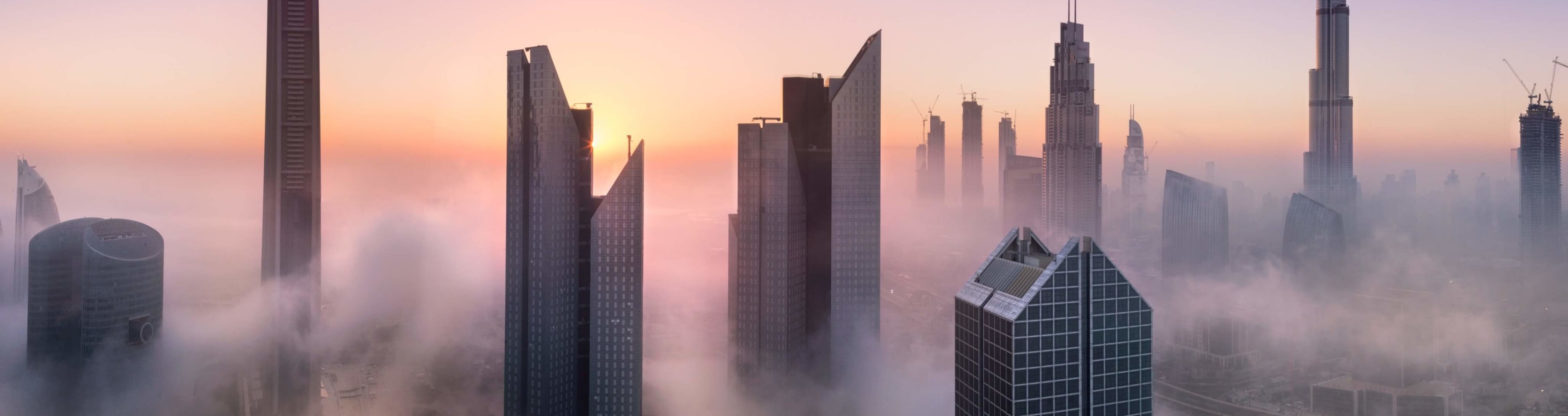 The towers of Dubai in the morning fogs of winter