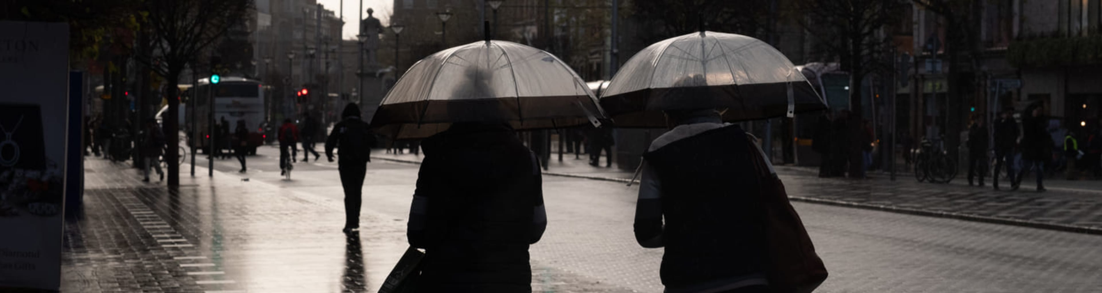 people in the rain