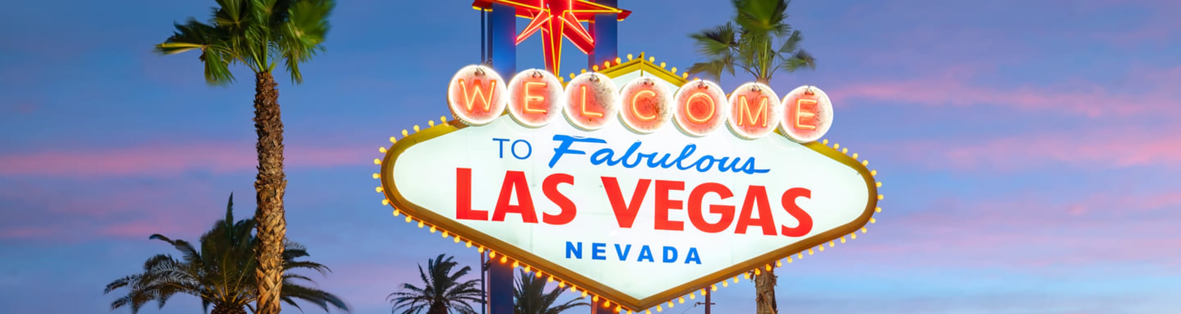 The 'Welcome to Fabulous Las Vegas' road sign at sunset