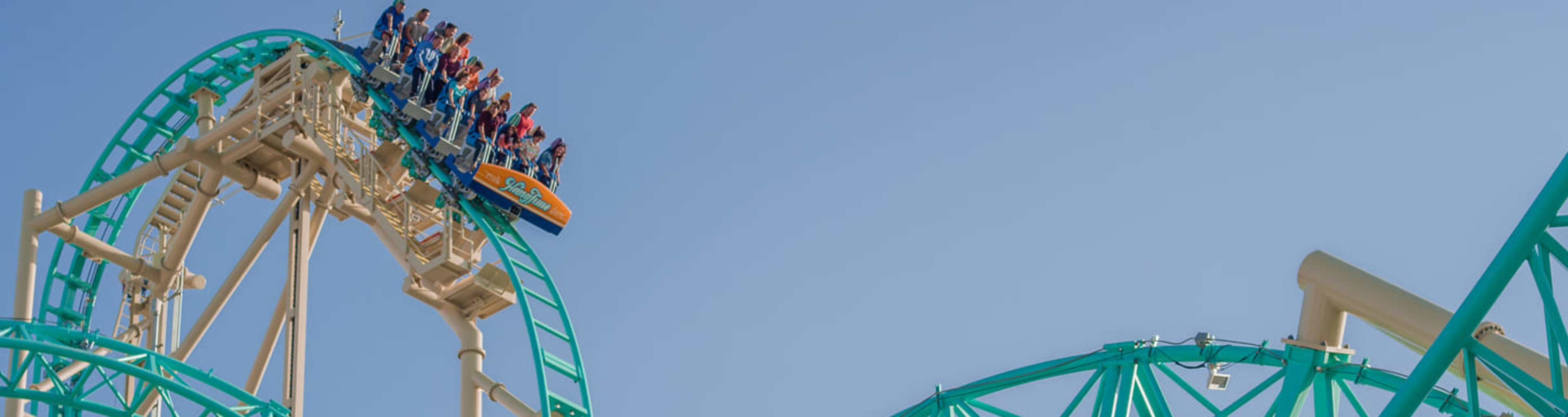 Riders at the top of the drop on the HangTime rollercoaster at Knott's Berry Farm, LA.