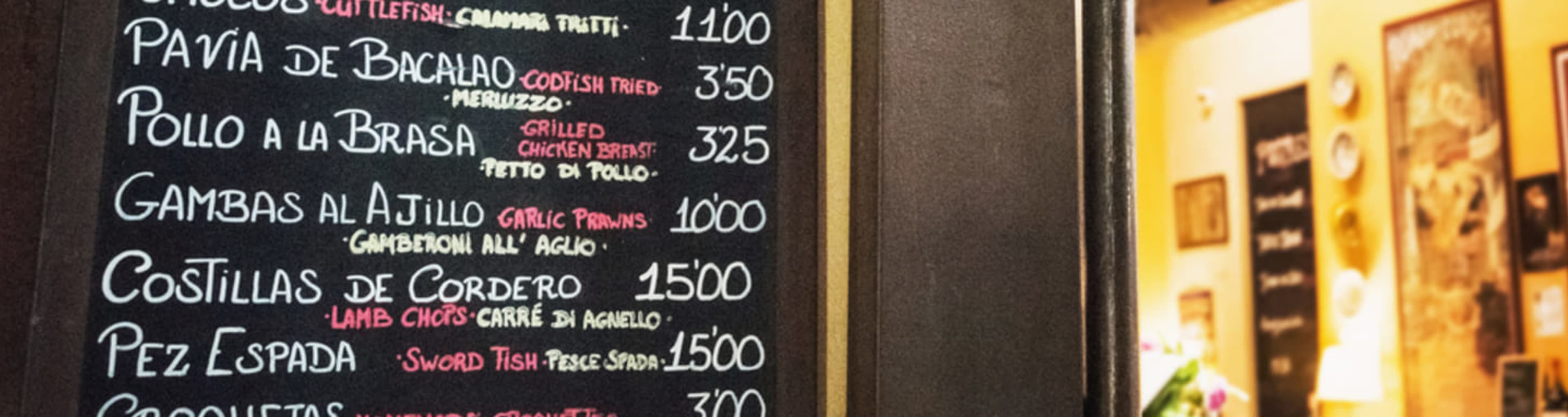 Tapas menu outside a restaurant in Madrid.