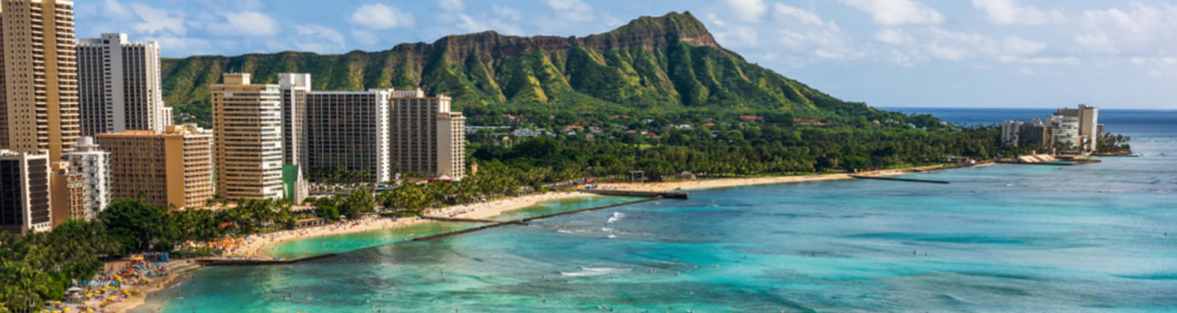 Honolulu panorama with Waikiki Beach and Diamond Head peak.