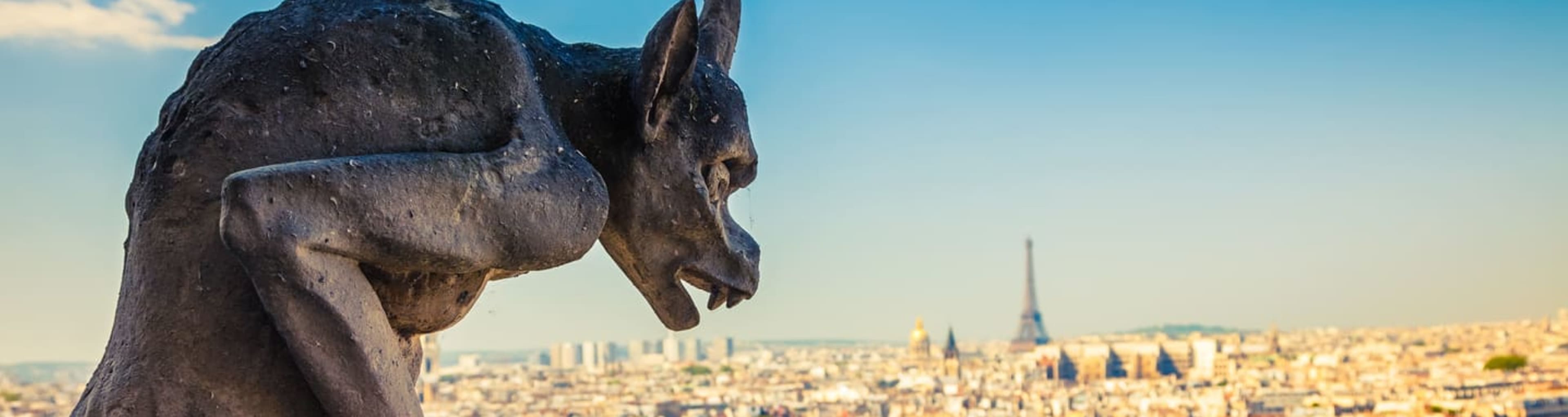 Gargoyle at Notre-Dame Cathedral overlooking the Paris skyline
