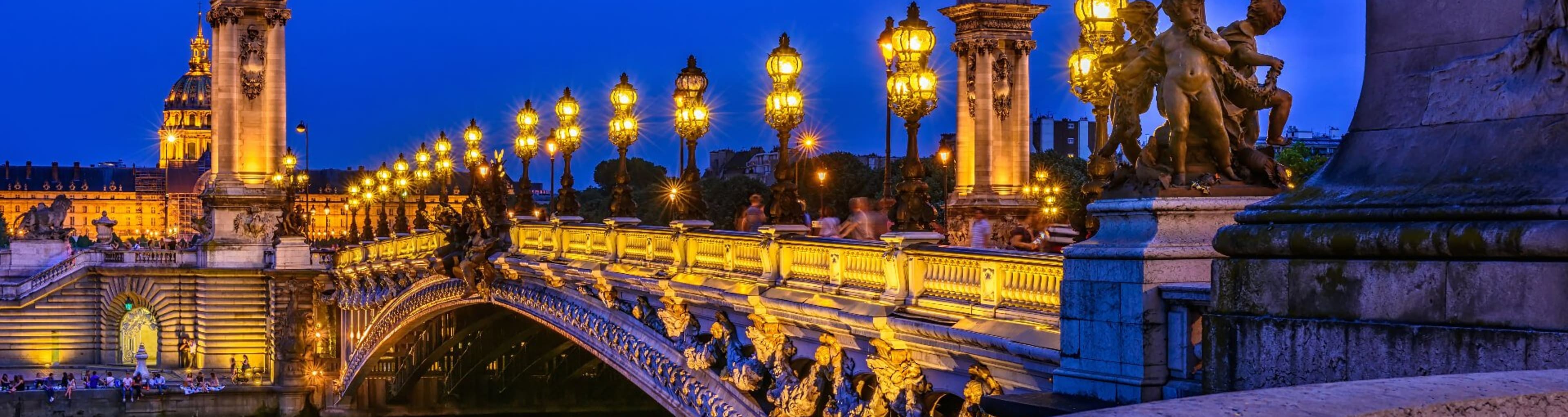 Alexander III Bridge over the Seine lit up at nightfall